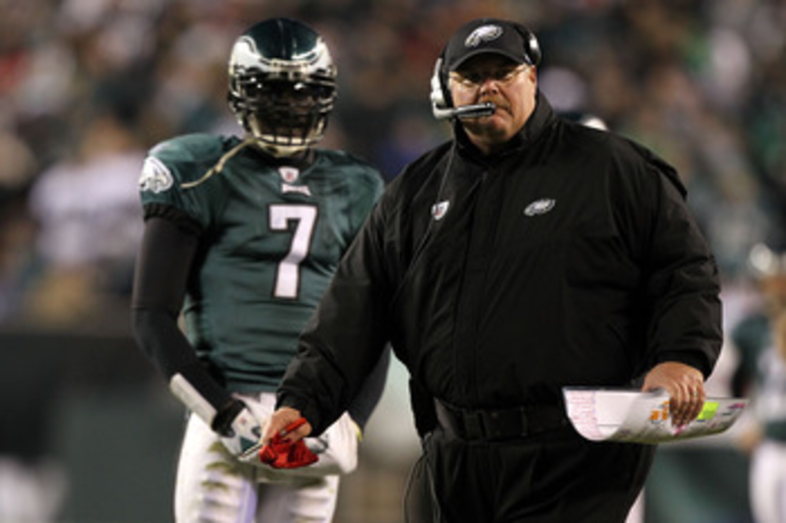 PHILADELPHIA, PA - DECEMBER 02:  Head coach Andy Reid of the Philadelphia Eagles throws the red challenge flag on a play involving Brent Celek #87 in the second half as Michael Vick #7 looks on against the Houston Texans at Lincoln Financial Field on Dece