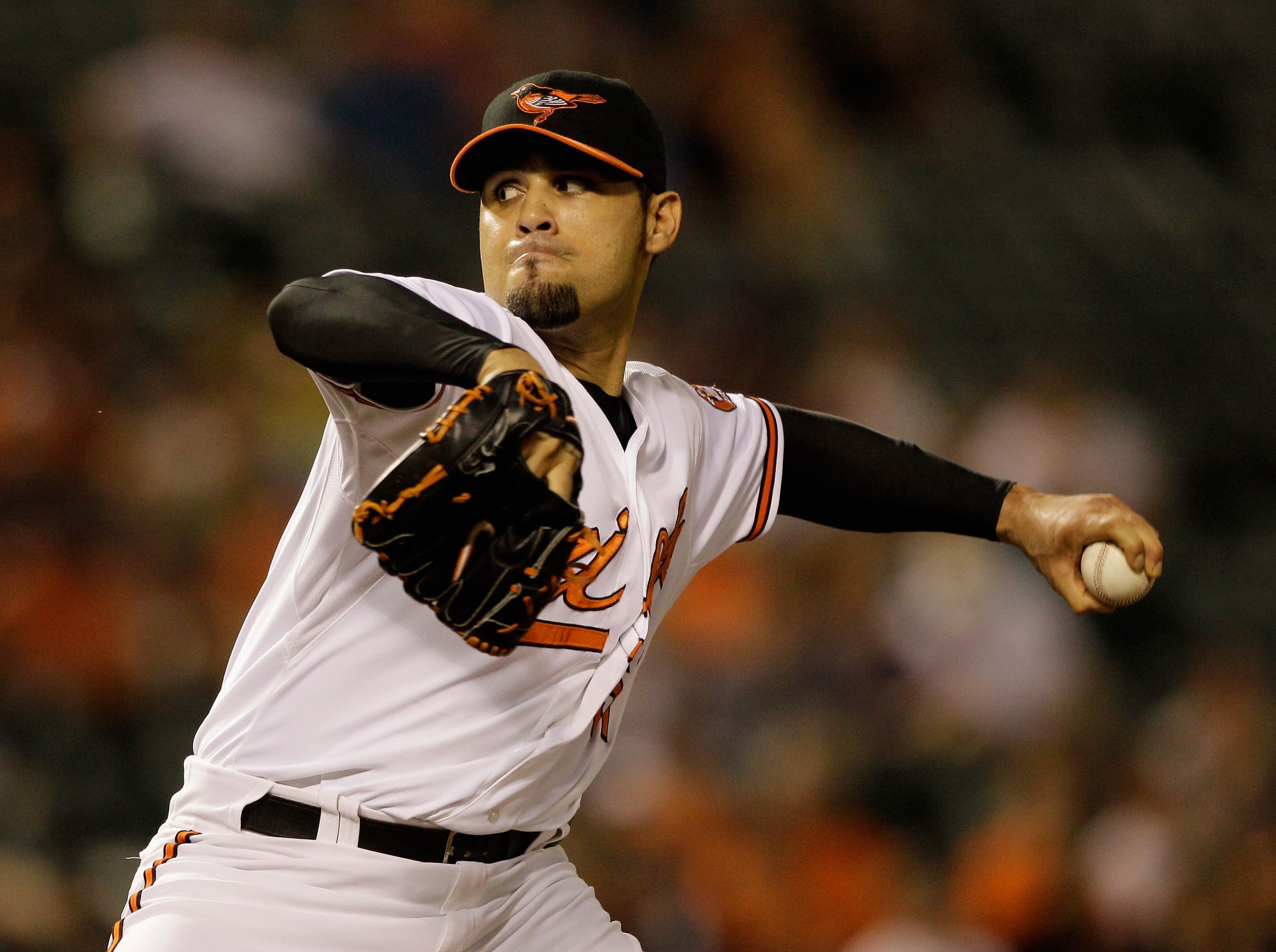 BALTIMORE, MD - MAY 25: Relief pitcher Mike Gonzalez #51 of the Baltimore Orioles delivers to a Kansas City Royals batter during the ninth inning at Oriole Park at Camden Yards on May 25, 2011 in Baltimore, Maryland.  (Photo by Rob Carr/Getty Images)