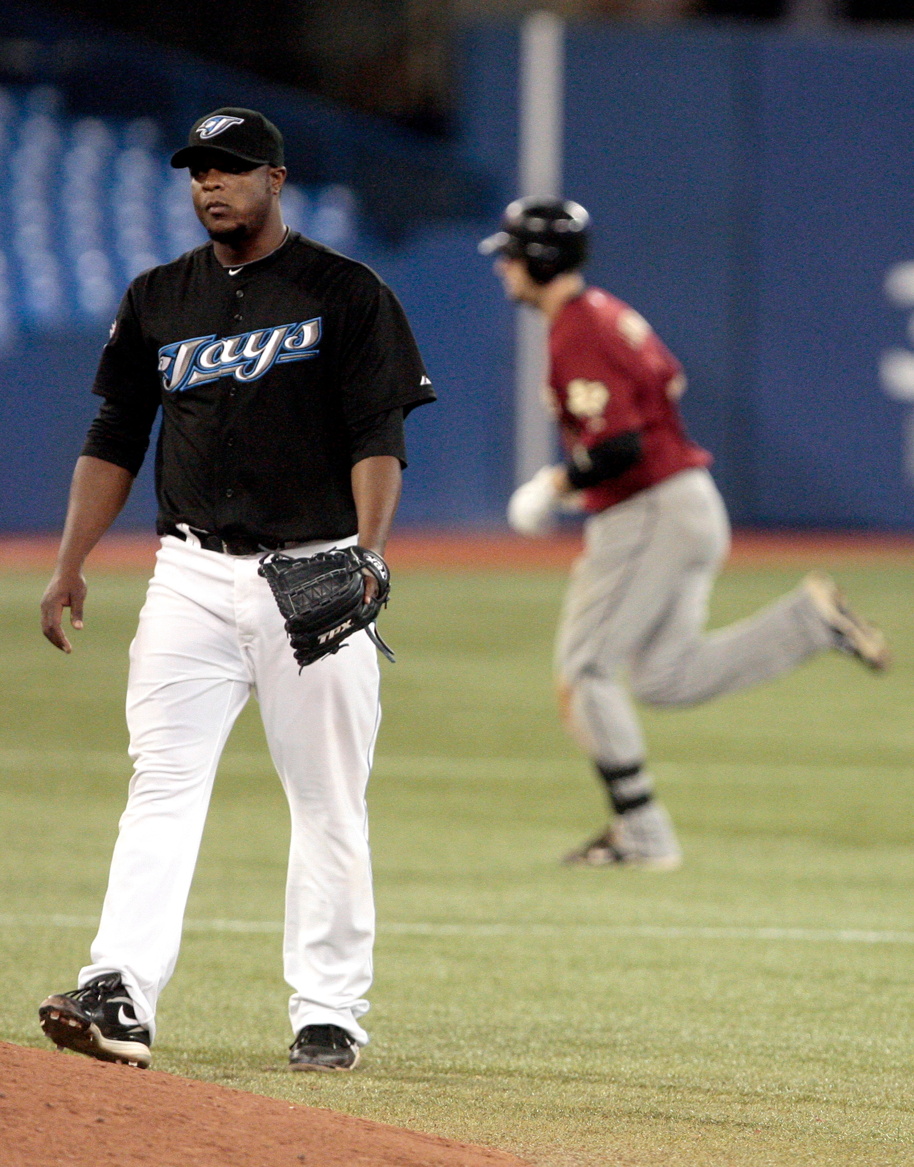TORONTO, CANADA - MAY 20: Chris Johnson #23 of the Houston Astros rounds the bases after a 2 run home run off of Frank Francisco #50 of the Toronto Blue Jays during MLB action at the Rogers Centre May 20, 2011 in Toronto, Ontario, Canada. (Photo by Abelim