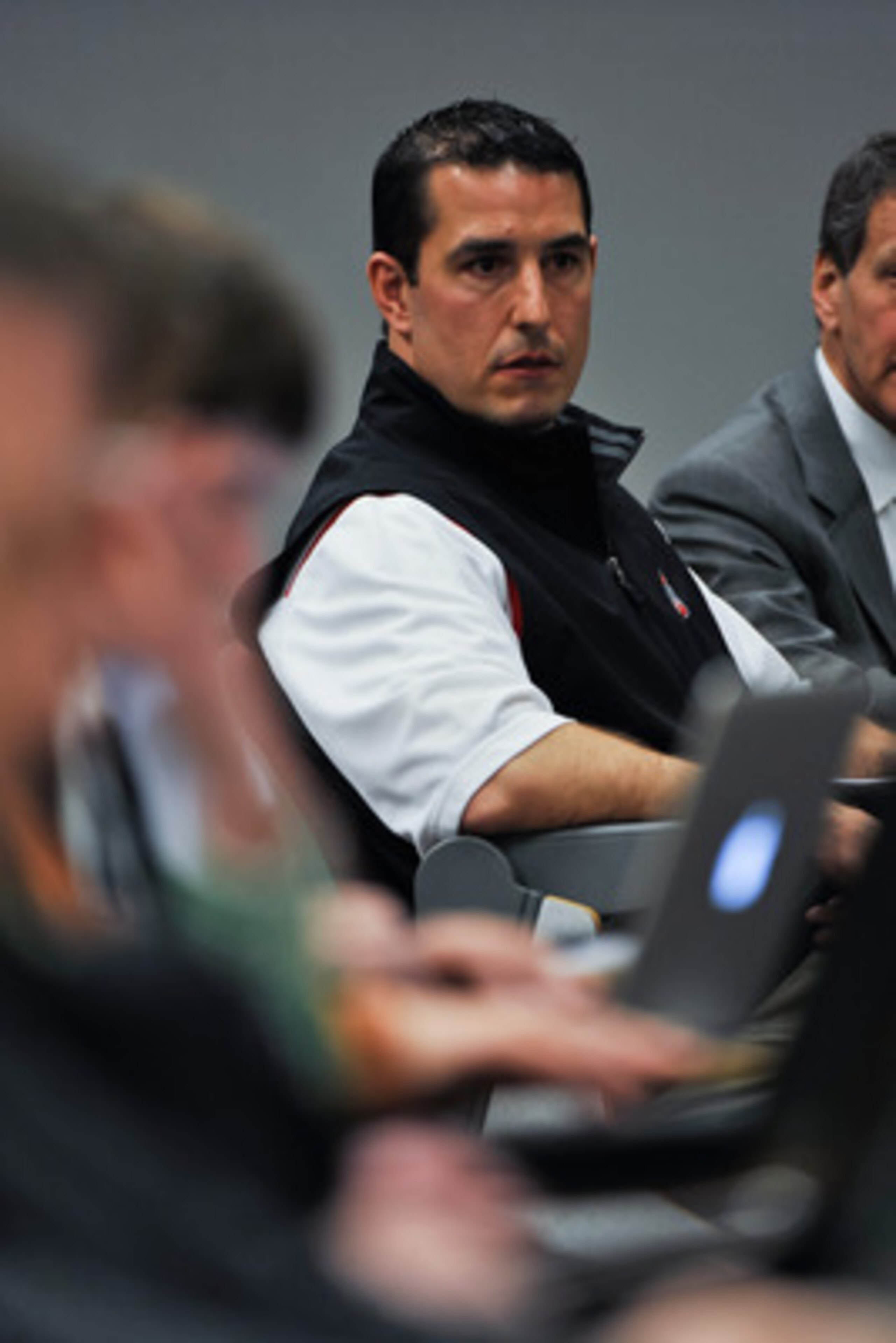 COLUMBUS, OH - MARCH 30:  Assitant Head Coach Luke Fickell listens during a press conference before the start of Spring practices at the Woody Hayes Athletic Center at The Ohio State University on March 30, 2011 in Columbus, Ohio. (Photo by Jamie Sabau/Ge