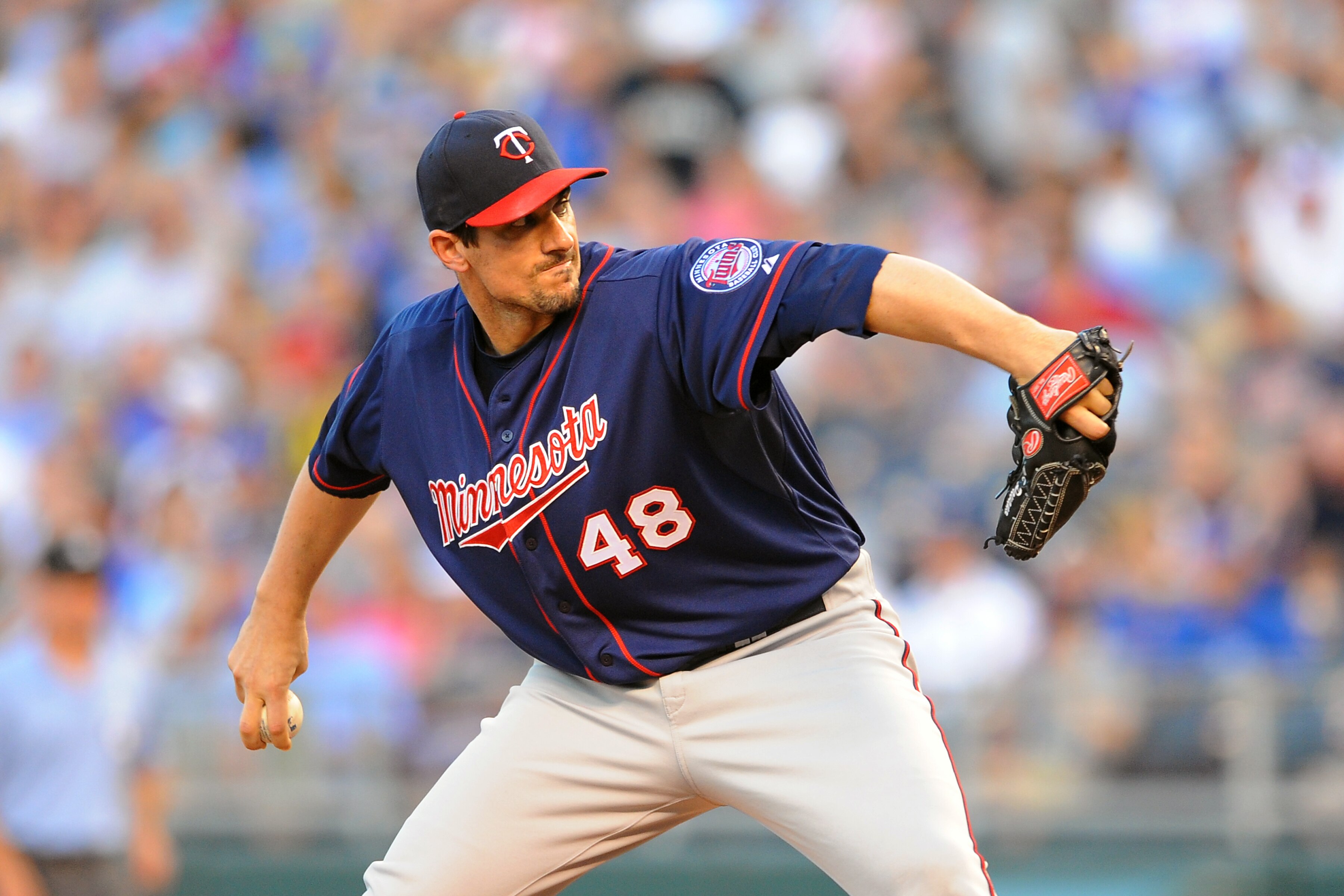 KANSAS CITY, MO - JUNE 3:  Starter Carl Pavano #48 of the Minnesota Twins pitches against the Kansas City Royals at Kauffman Stadium on June 3, 2011 in Kansas City, Missouri. (Photo by G. Newman Lowrance/Getty Images)