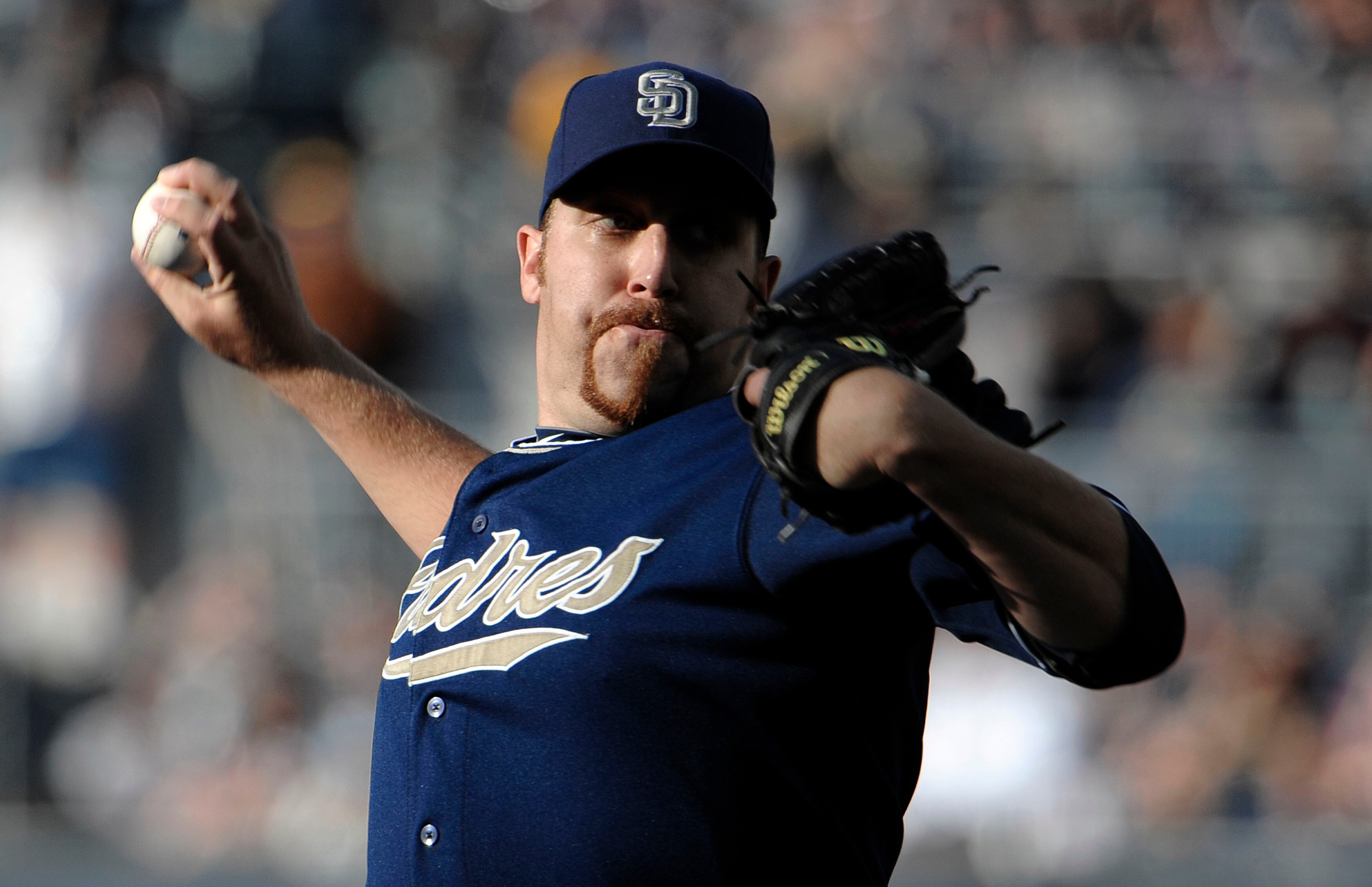 SAN DIEGO, CA - JUNE 4: Aaron Harang #41 of the San Diego Padres pitches during the first inning of a baseball game against the Houston Astros at Petco Park on June 4, 2011 in San Diego, California.  (Photo by Denis Poroy/Getty Images)