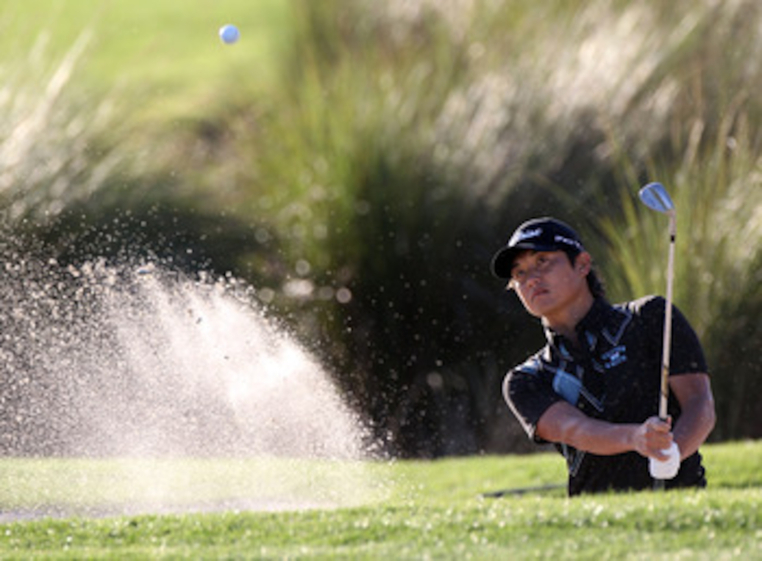 PALM BEACH GARDENS, FL - MARCH 04:  Ryuji Imada hits a shot during the second round of The Honda Classic at PGA National Resort and Spa on March 4, 2011 in Palm Beach Gardens, Florida.  (Photo by Sam Greenwood/Getty Images)