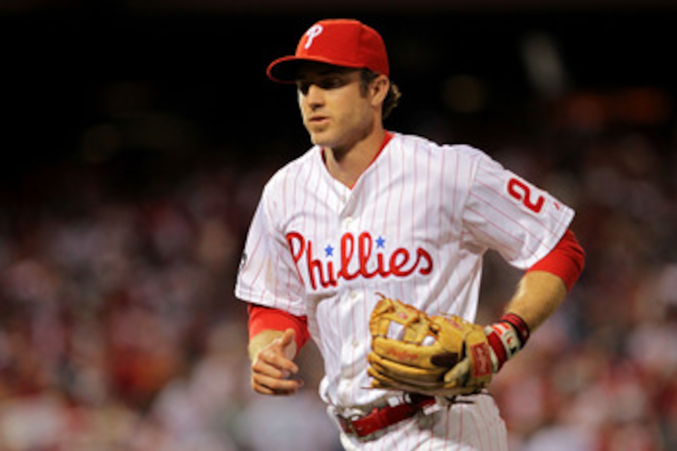 PHILADELPHIA - OCTOBER 23:  Chase Utley #26 of the Philadelphia Phillies runs off the field after turing a double play against the San Francisco Giants in Game Six of the NLCS during the 2010 MLB Playoffs at Citizens Bank Park on October 23, 2010 in Phila