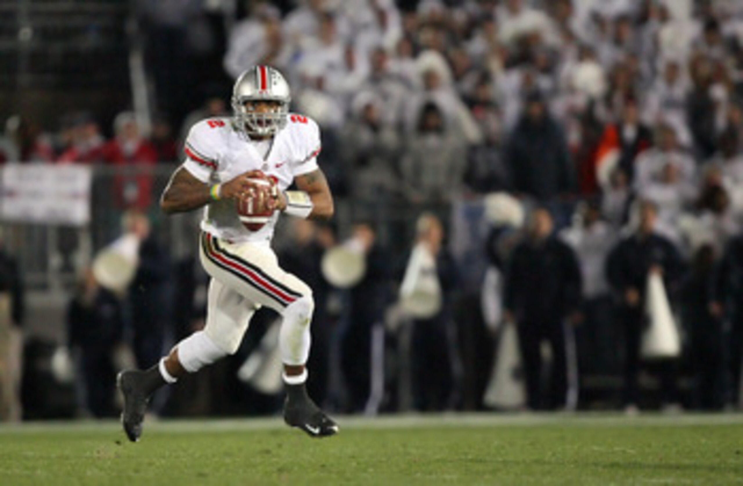 STATE COLLEGE, PA - NOVEMBER 7: Quarterback Terrelle Pryor #2 of the Ohio State Buckeyes rolls out to pass during a game against the Penn State Nittany Lions on November 7, 2009 at Beaver Stadium in State College, Pennsylvania. Ohio State won 24-7. (Photo