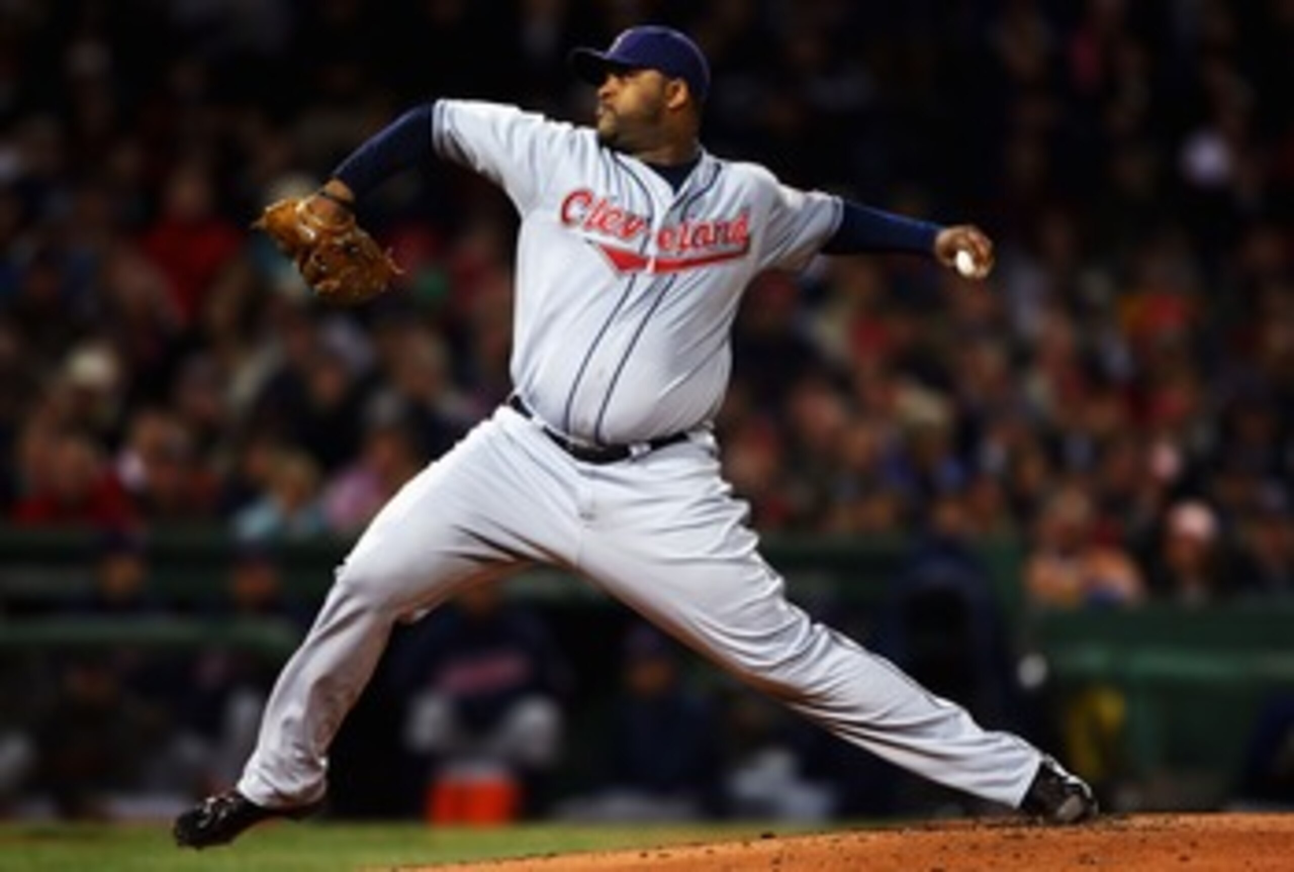 BOSTON - OCTOBER 12:  Starting pitcher C.C. Sabathia #52 of the Cleveland Indians pitches during Game One of the American League Championship Series against the Boston Red Sox at Fenway Park on October 12, 2007 in Boston, Massachusetts.  (Photo by Elsa/Ge