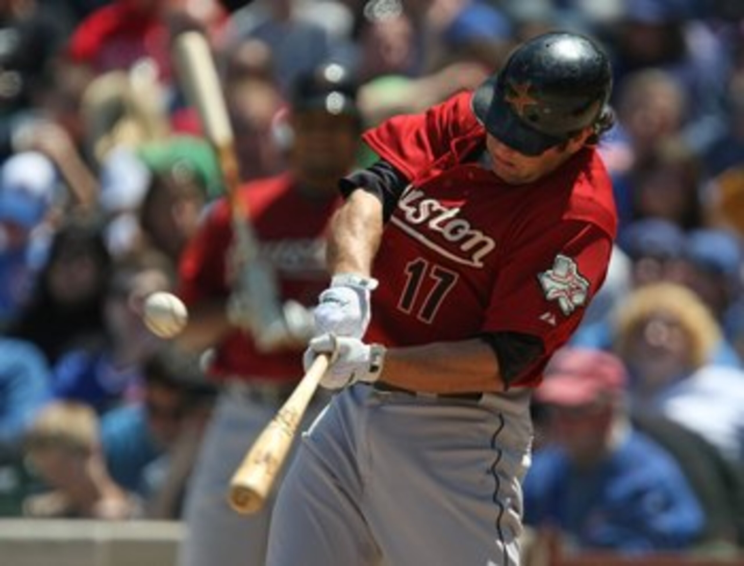CHICAGO - MAY 16: Lance Berkman #17 of the Houston Astros hits the ball against the Chicago Cubs on May 16, 2009 at Wrigley Field in Chicago, Illinois. The Cubs defeated the Astros 5-4. (Photo by Jonathan Daniel/Getty Images)