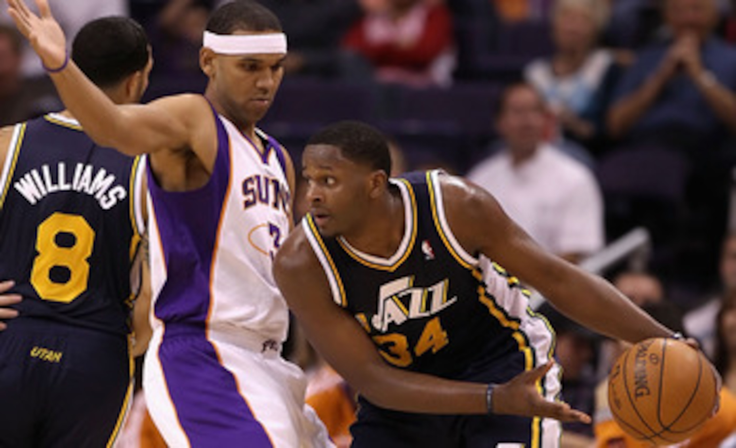 PHOENIX - OCTOBER 12:  C.J. Miles #34 of the Utah Jazz handles the ball during the preseason NBA game against the Phoenix Suns at US Airways Center on October 12, 2010 in Phoenix, Arizona. NOTE TO USER: User expressly acknowledges and agrees that, by down