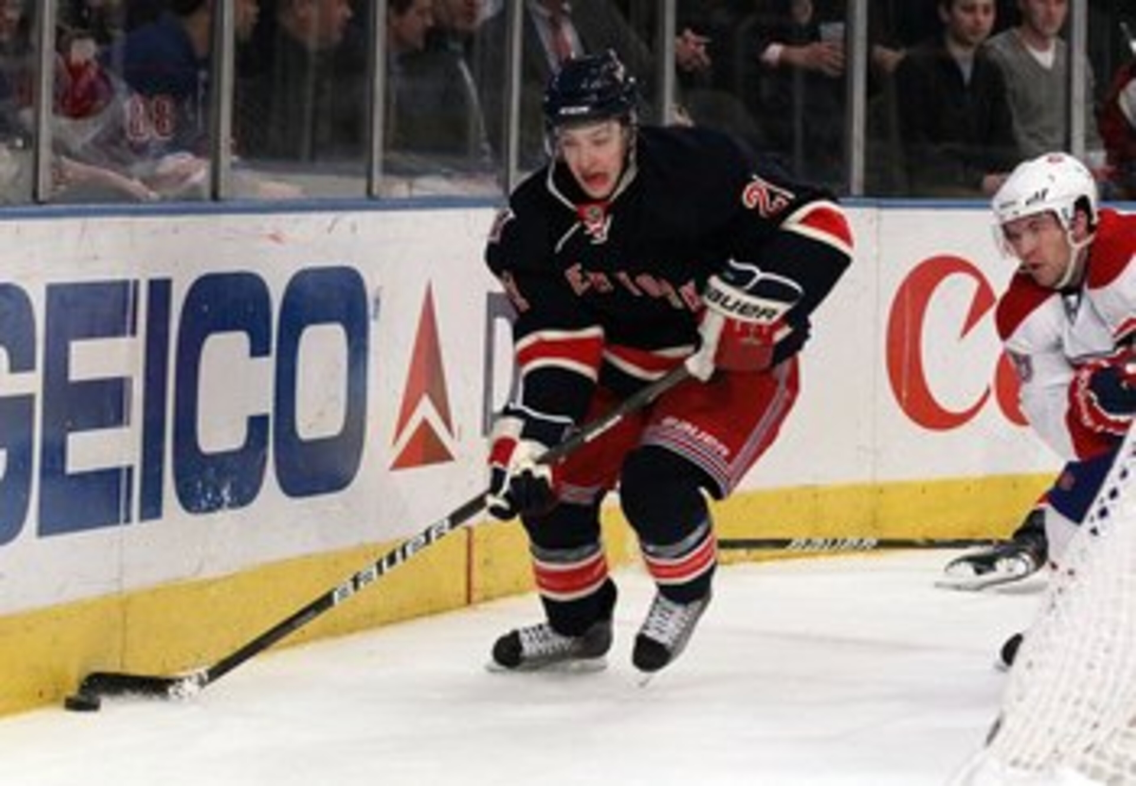 NEW YORK, NY - JANUARY 11:  Derek Stepan #21 of the New York Rangers skates against the Montreal Canadiens on January 11, 2011 at Madison Square Garden in New York City. Montreal defeated the Rangers 2-1.  (Photo by Jim McIsaac/Getty Images)