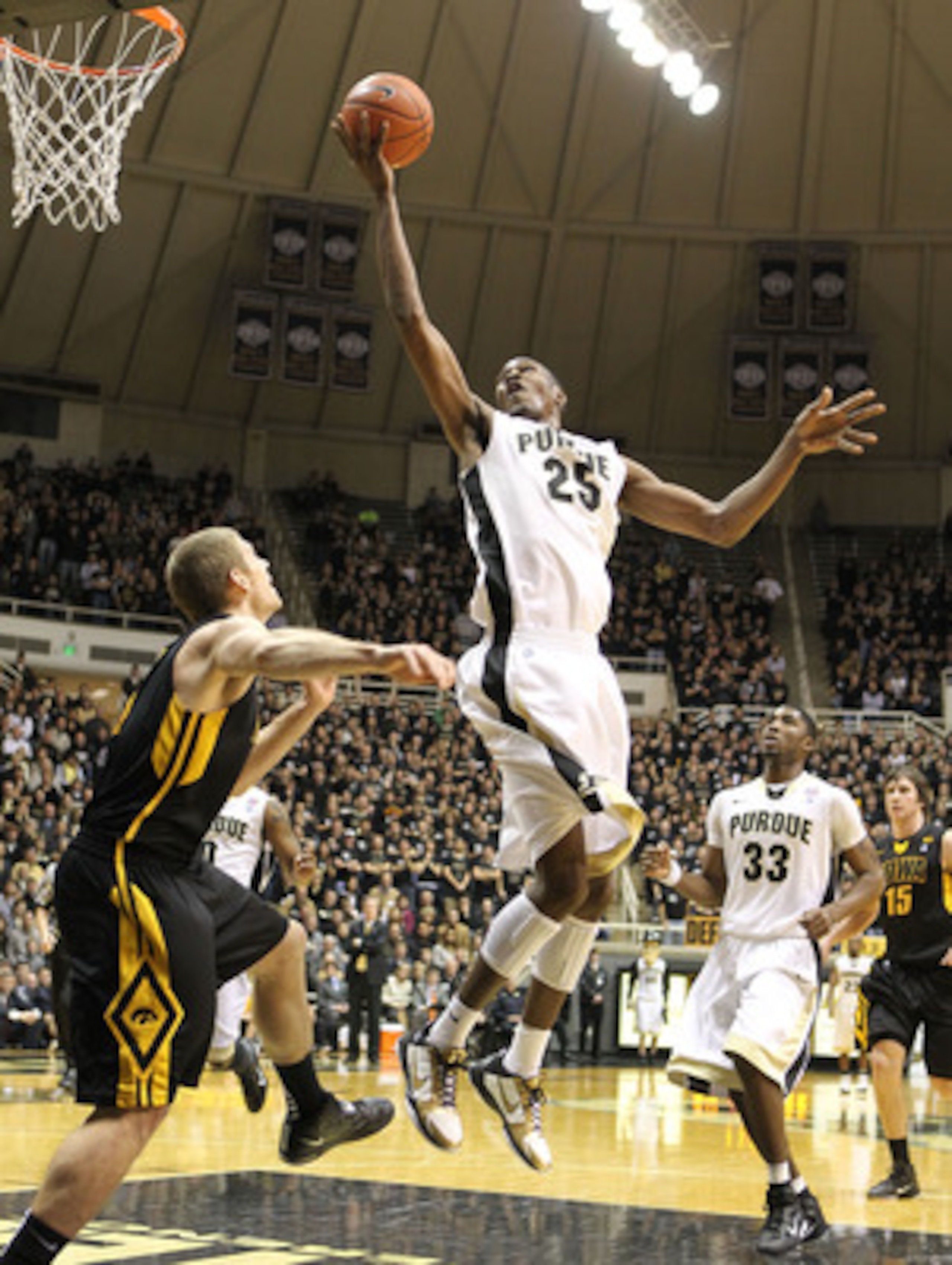 WEST LAFAYETTE, IN - JANUARY 09:  JaJuan Johnson #25 of the Purdue Boilermakers shoots the ball during the Big Ten Conference game against the Iowa Hawkeyes at Mackey Arena on January 9, 2011 in West Lafayette, Indiana.  Purdue won 75-52.  (Photo by Andy 