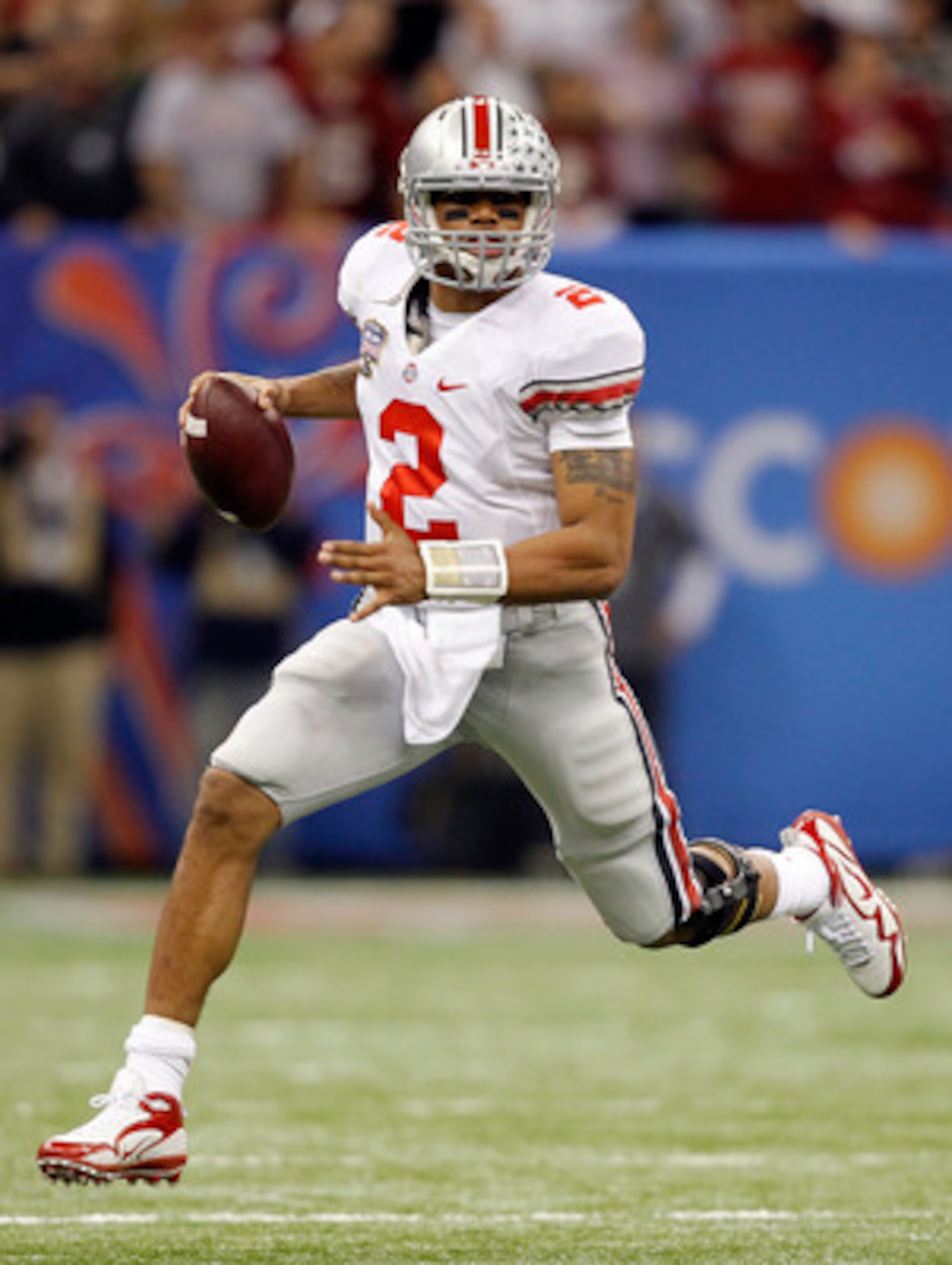 NEW ORLEANS, LA - JANUARY 04:  Terrelle Pryor #2 of the Ohio State Buckeyes looks to pass in the second half against the Arkansas Razorbacks during the Allstate Sugar Bowl at the Louisiana Superdome on January 4, 2011 in New Orleans, Louisiana.  (Photo by