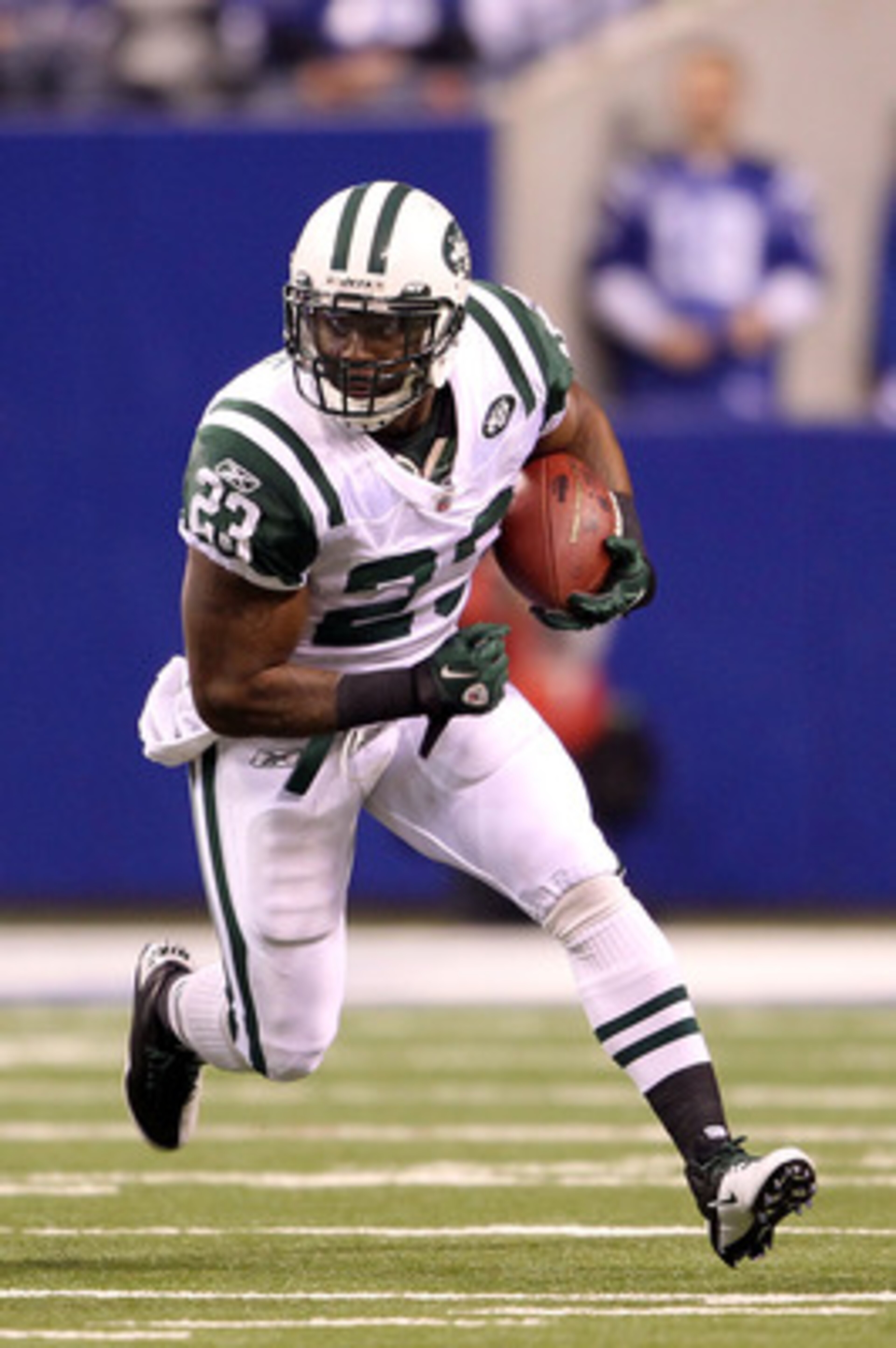 INDIANAPOLIS, IN - JANUARY 08:  Shonn Greene #23 of the New York Jets runs the ball against the Indianapolis Colts during their 2011 AFC wild card playoff game at Lucas Oil Stadium on January 8, 2011 in Indianapolis, Indiana.  (Photo by Andy Lyons/Getty I