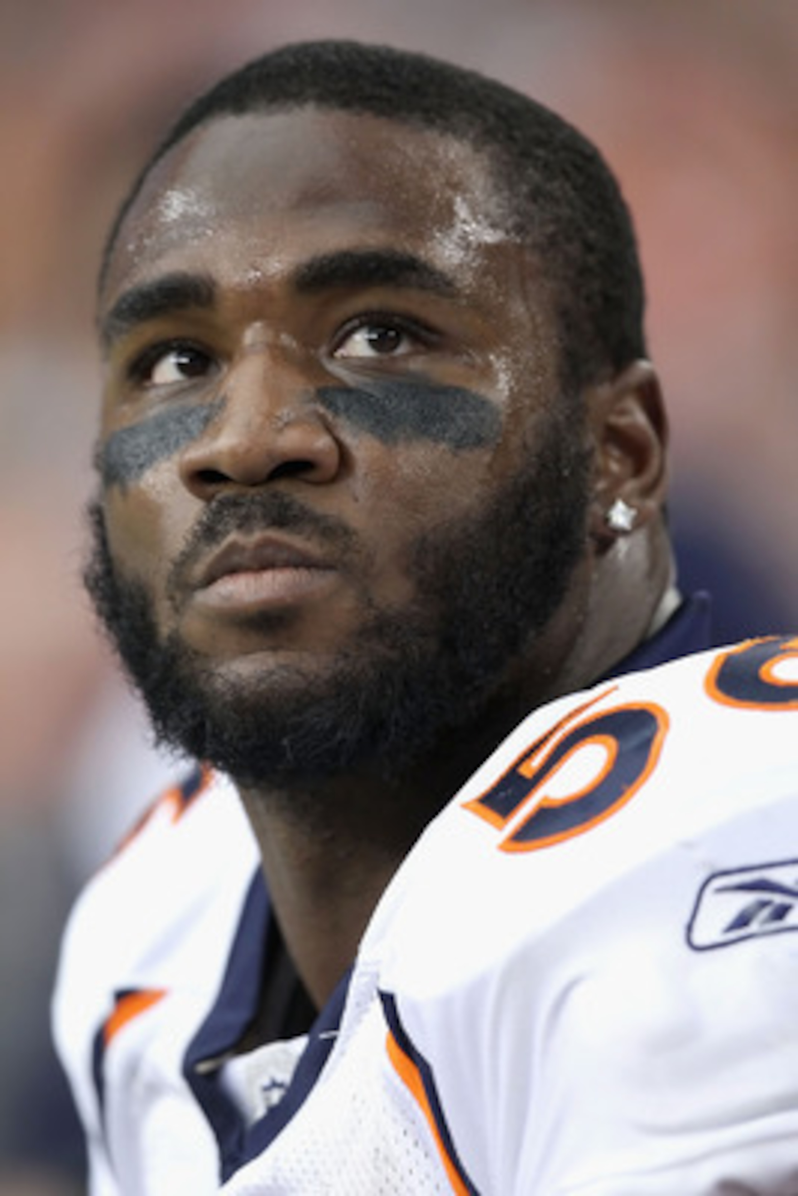 GLENDALE, AZ - DECEMBER 12:  Linebacker Robert Ayers #56 of the Denver Broncos sits on the sidelines during the NFL game against the Arizona Cardinals at the University of Phoenix Stadium on December 12, 2010 in Glendale, Arizona.  The Cardinals defeated