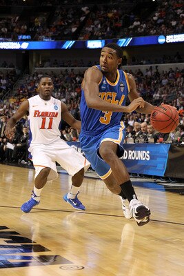 TAMPA, FL - MARCH 19:  Malcolm Lee #3 of the UCLA Bruins drives against Erving Walker #11 of the Florida Gators during the third round of the 2011 NCAA men's basketball tournament at St. Pete Times Forum on March 19, 2011 in Tampa, Florida.  (Photo by Mik