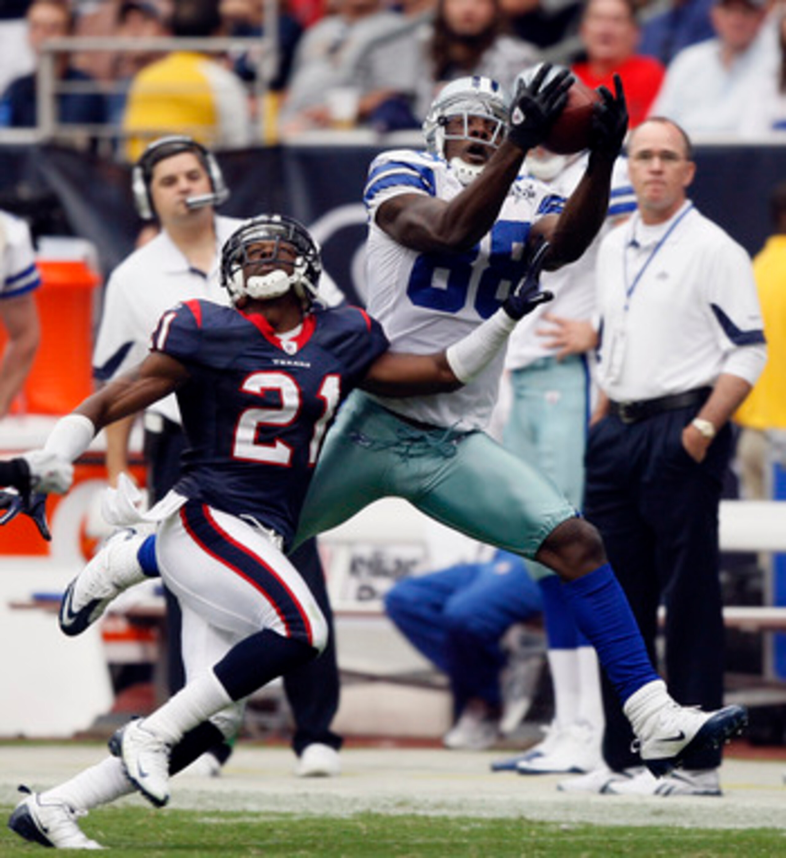 HOUSTON - SEPTEMBER 26:  Wide receiver Dez Bryant #88 of the Dallas Cowboys completes a 30 yard reception as he beats cornerbacks Brice McCain #21 and Eugene Glover #25 of the Houston Texans on the play at Reliant Stadium on September 26, 2010 in Houston,