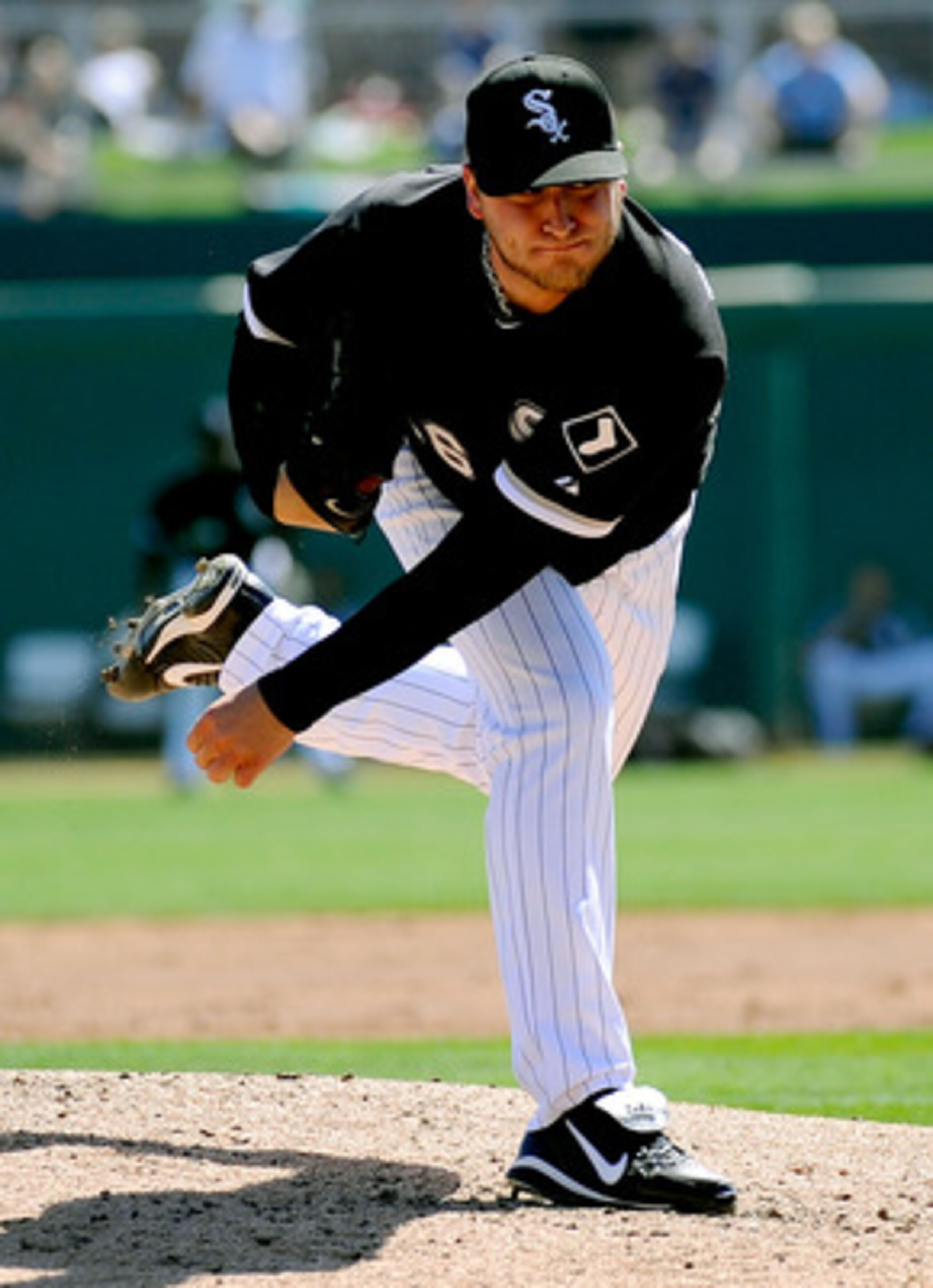 GLENDALE, AZ - MARCH 11:  Mark Buehrle #56 of the Chicago White Sox pitches during the spring training baseball game against Chicago Cubs at Camelback Ranch on March 11, 2011 in Glendale, Arizona.  (Photo by Kevork Djansezian/Getty Images)