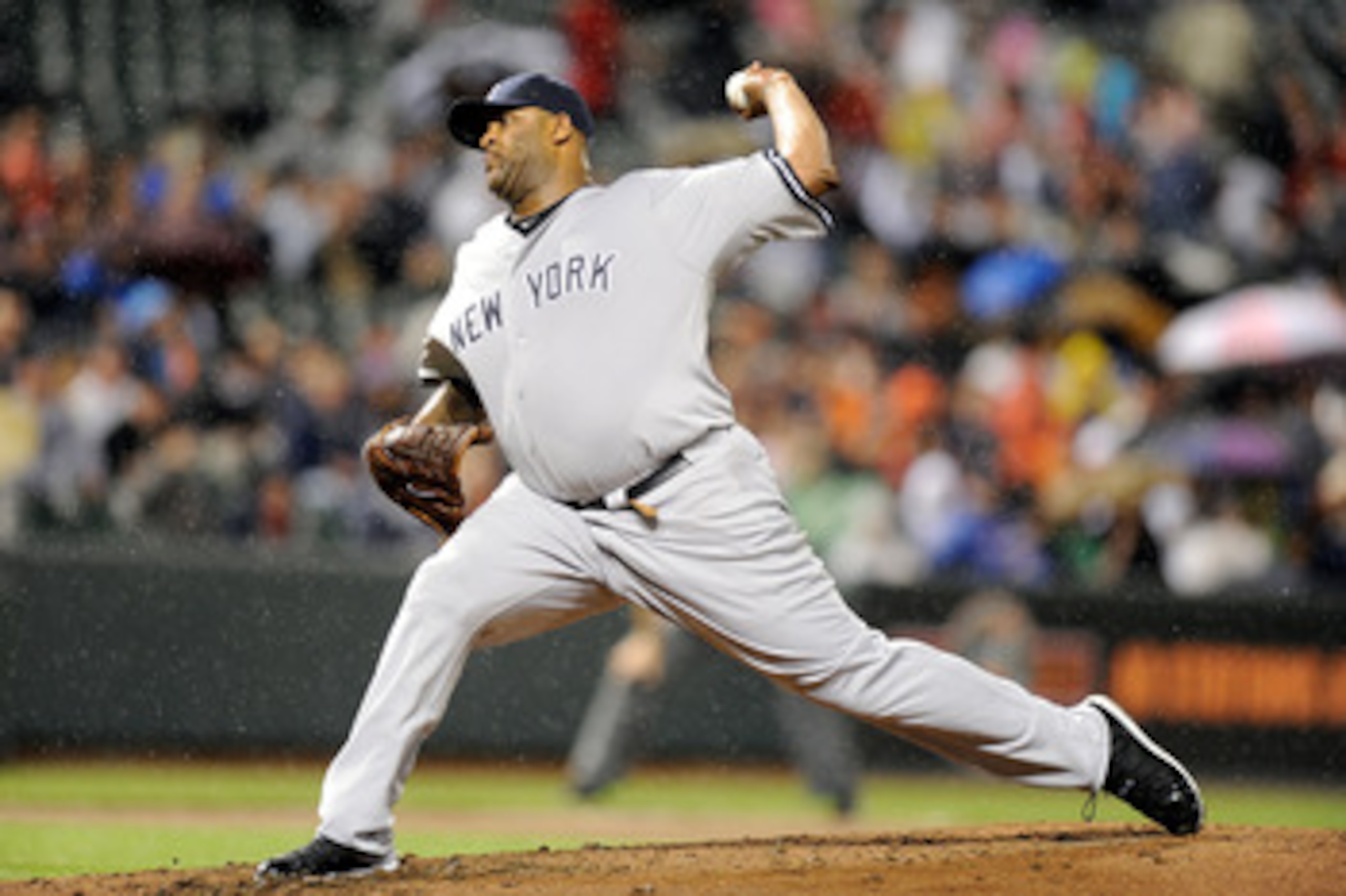 BALTIMORE, MD - MAY 19:  C.C. Sabathia #52 of the New York Yankees pitches against the Baltimore Orioles at Oriole Park at Camden Yards on May 19, 2011 in Baltimore, Maryland.  (Photo by Greg Fiume/Getty Images)