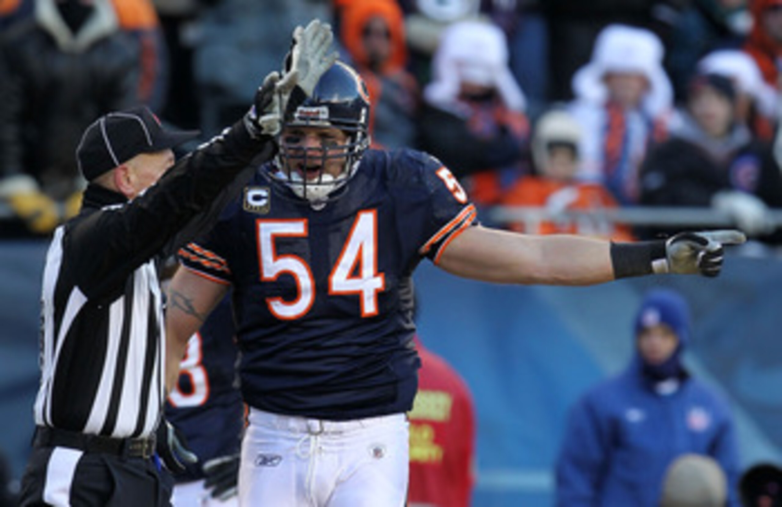 CHICAGO, IL - JANUARY 23:  Brian Urlacher #54 of the Chicago Bears reacts to a penalty called while taking on the Green Bay Packers in the NFC Championship Game at Soldier Field on January 23, 2011 in Chicago, Illinois.  (Photo by Jamie Squire/Getty Image