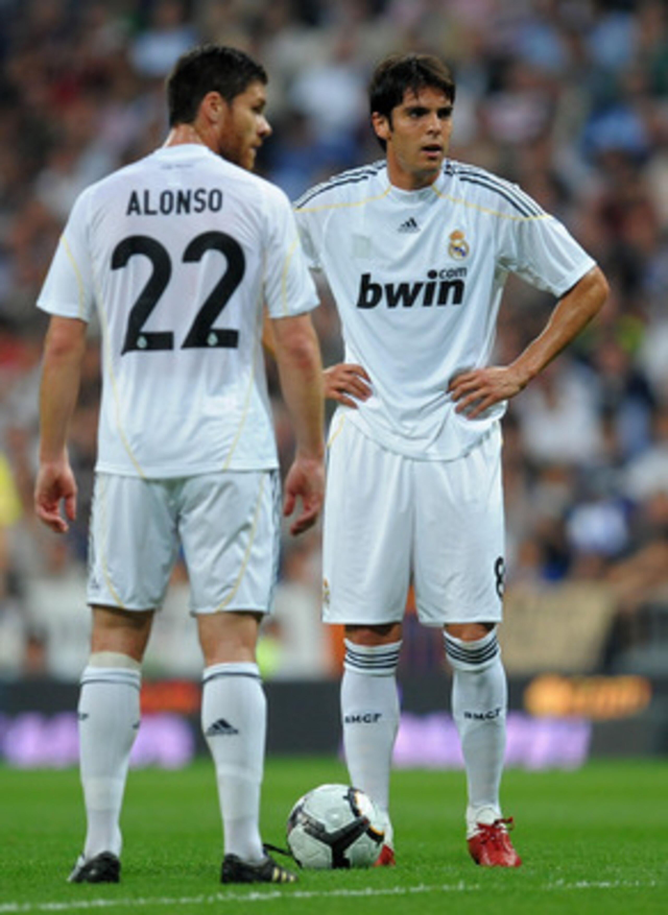 MADRID, SPAIN - OCTOBER 31: Kaka (R) of Real Madrid stands with his teammate Xabi Alonso prior to taking a free kick during the La Liga match between Real Madrid and Getafe at Estadio Santiago Bernabeu on October 31, 2009 in Madrid, Spain. Real Madrid wo MADRID, SPAIN - OCTOBER 31: Kaka (R) of Real Madrid stands with his teammate Xabi Alonso prior to taking a free kick during the La Liga match between Real Madrid and Getafe at Estadio Santiago Bernabeu on October 31, 2009 in Madrid, Spain. Real Madrid wo