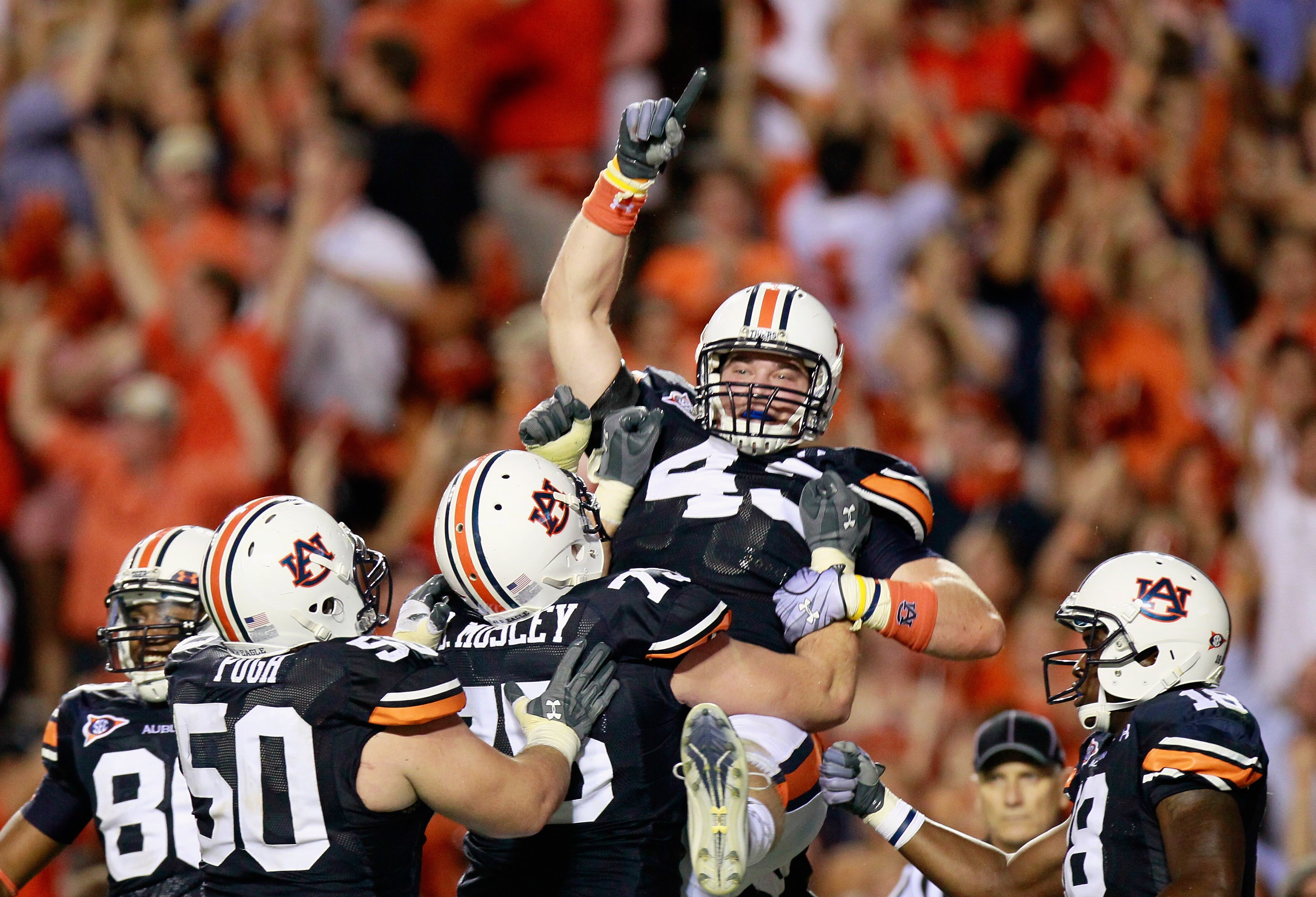AUBURN, AL - SEPTEMBER 25:  Philip Lutzenkirchen #43 of the Auburn Tigers celebrate after pulling in this go-ahead touchdown reception against the South Carolina Gamecocks at Jordan-Hare Stadium on September 25, 2010 in Auburn, Alabama.  (Photo by Kevin C