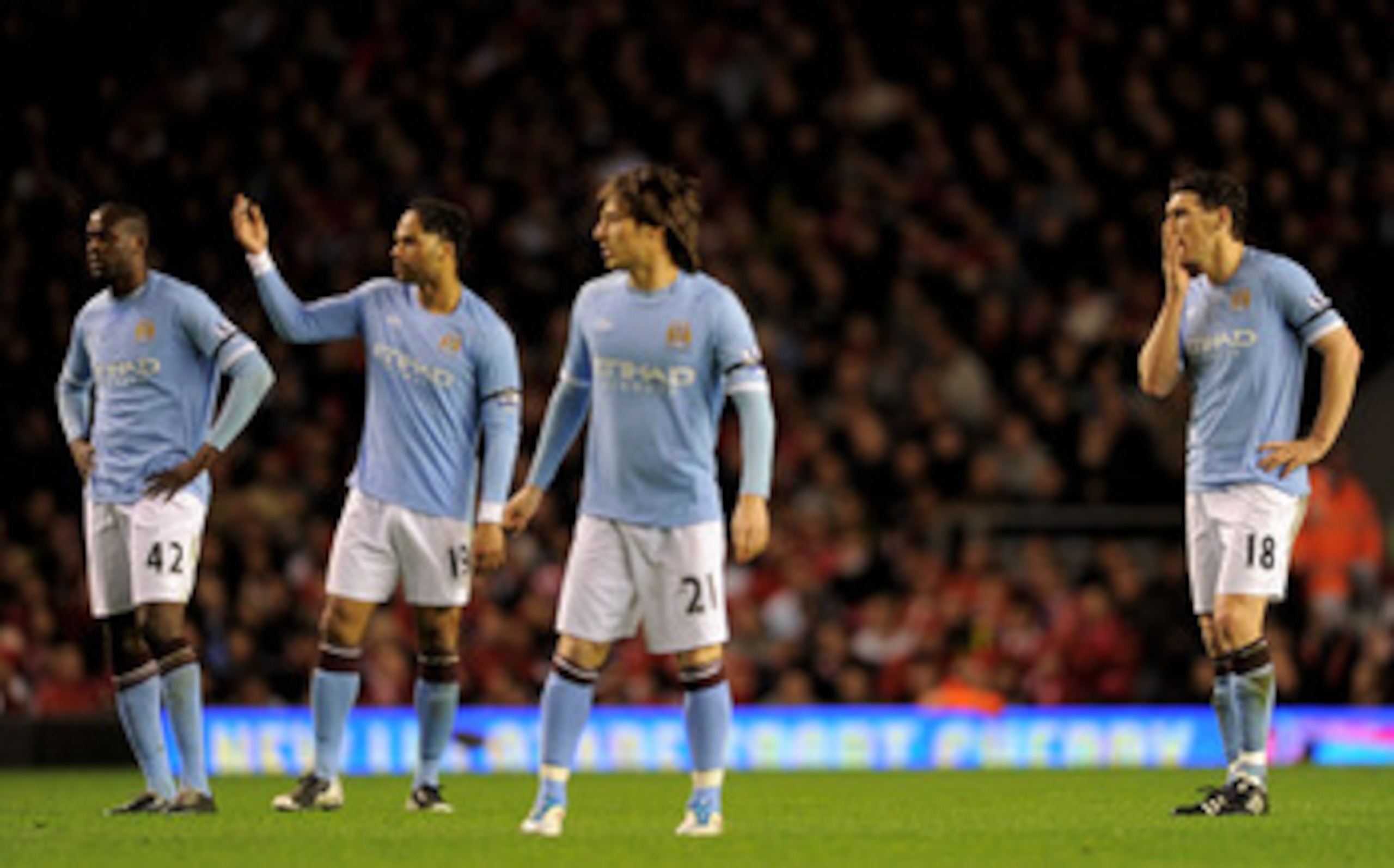 LIVERPOOL, ENGLAND - APRIL 11: (L-R) Yaya Toure, Joleon Lescott, David Silva and Gareth Barry of Manchester City look dejected during the Barclays Premier League match between Liverpool and Manchester City at Anfield on April 11, 2011 in Liverpool, Engla LIVERPOOL, ENGLAND - APRIL 11: (L-R) Yaya Toure, Joleon Lescott, David Silva and Gareth Barry of Manchester City look dejected during the Barclays Premier League match between Liverpool and Manchester City at Anfield on April 11, 2011 in Liverpool, Engla