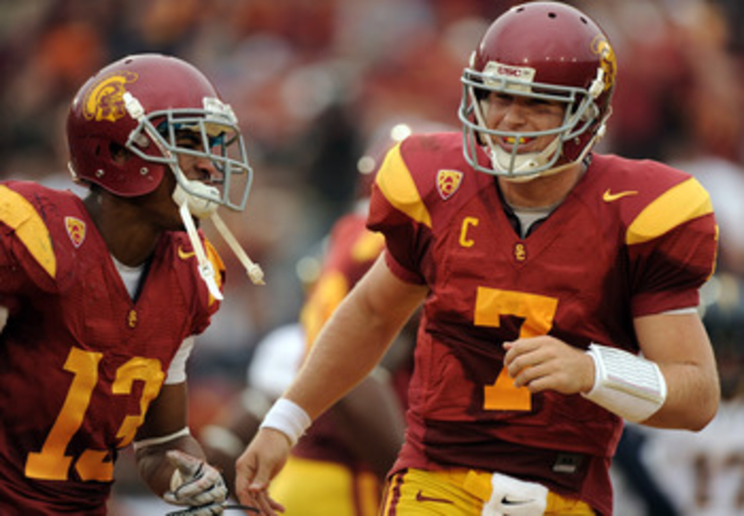 LOS ANGELES, CA - OCTOBER 16:  Matt Barkley #7 and Robert Woods #13 of the USC Trojans celebrate a touchdown for a 28-0 lead over the California Golden Bears during the second quarter at Los Angeles Memorial Coliseum on October 16, 2010 in Los Angeles, Ca
