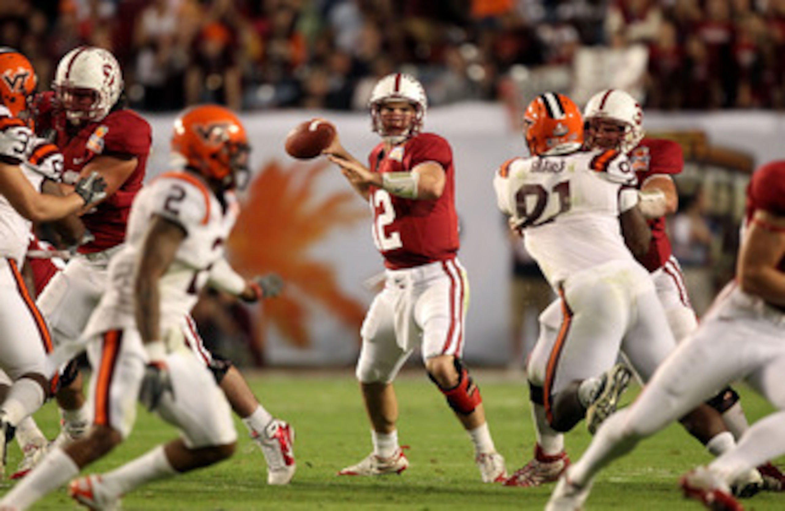 MIAMI, FL - JANUARY 03:  Quarterback Andrew Luck #12 of the Stanford Cardinal throws a pass against the Virginia Tech Hokies during the 2011 Discover Orange Bowl at Sun Life Stadium on January 3, 2011 in Miami, Florida. Stanford won 40-12. (Photo by Stree