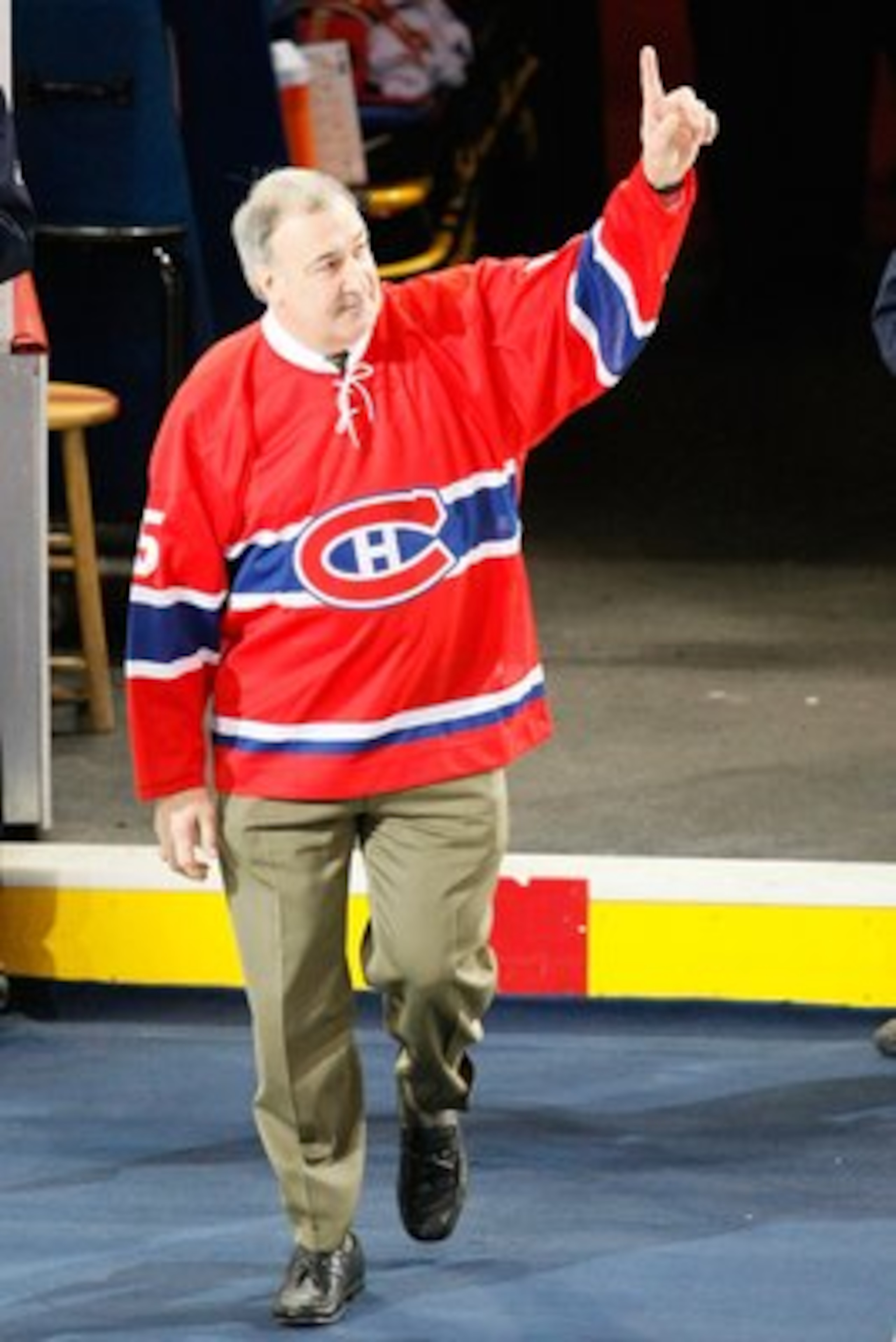 MONTREAL- JANUARY 8: Former Montreal Canadiens player Guy Lapointe waves to fans during pre-game ceremonies before the game between the Toronto Maple Leafs and the Montreal Canadiens at the Bell Centre on January 08, 2009 in Montreal, Quebec, Canada. T MONTREAL- JANUARY 8: Former Montreal Canadiens player Guy Lapointe waves to fans during pre-game ceremonies before the game between the Toronto Maple Leafs and the Montreal Canadiens at the Bell Centre on January 08, 2009 in Montreal, Quebec, Canada. T