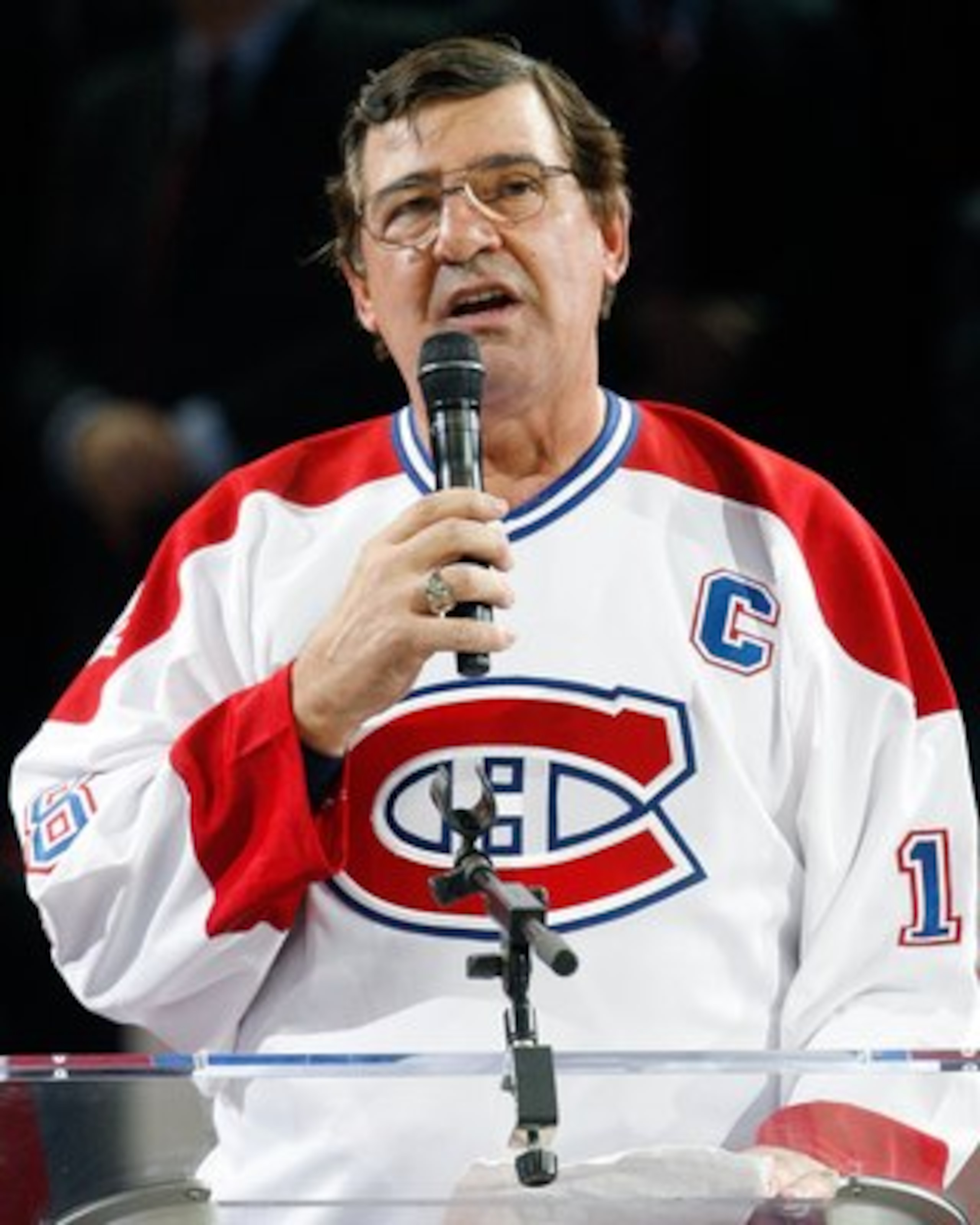 MONTREAL- DECEMBER 4: Former Montreal Canadien Serge Savard speaks to fans during the Centennial Celebration ceremonies prior to the NHL game between the Montreal Canadiens and Boston Bruins on December 4, 2009 at the Bell Centre in Montreal, Quebec, Can MONTREAL- DECEMBER 4: Former Montreal Canadien Serge Savard speaks to fans during the Centennial Celebration ceremonies prior to the NHL game between the Montreal Canadiens and Boston Bruins on December 4, 2009 at the Bell Centre in Montreal, Quebec, Can