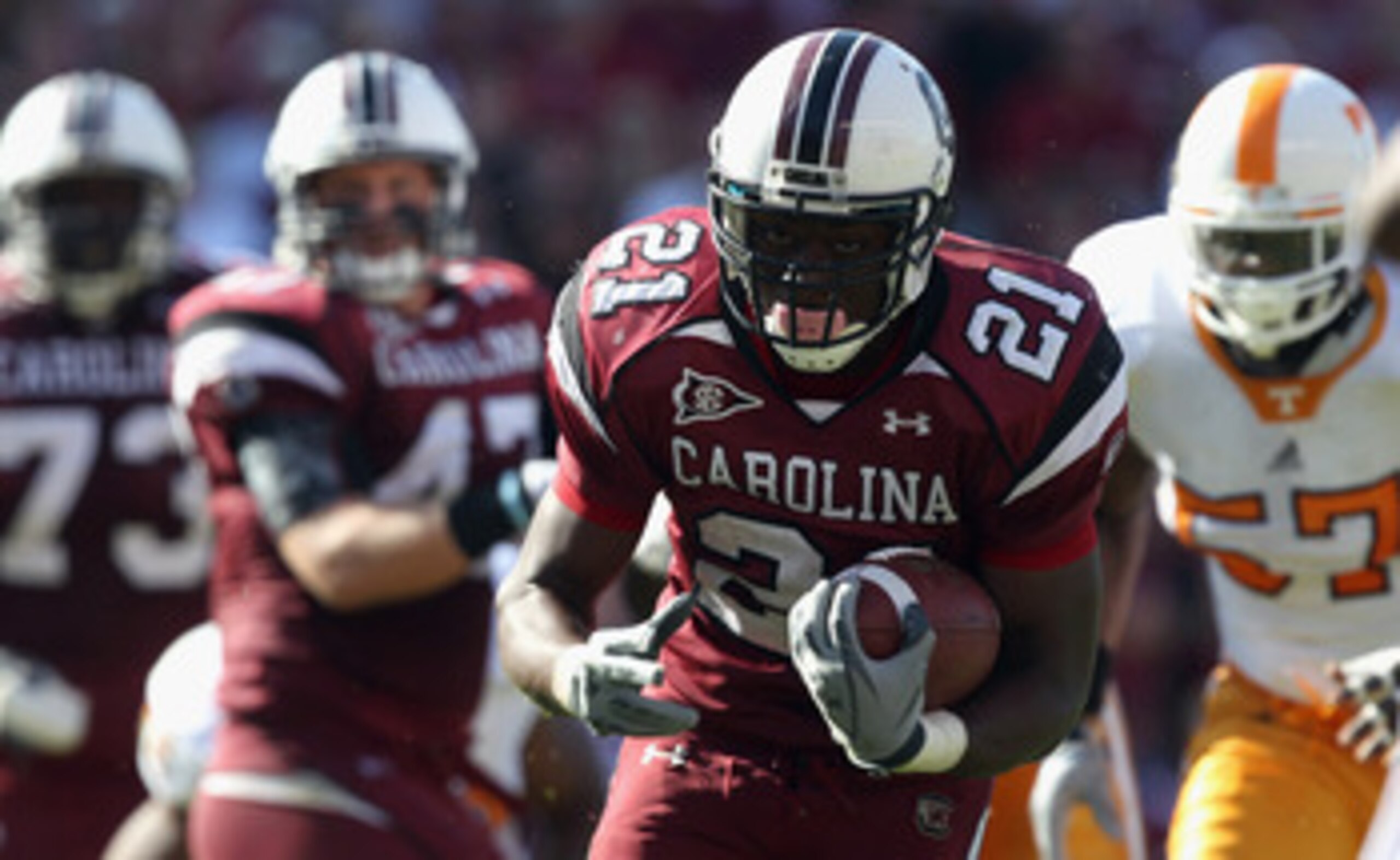 COLUMBIA, SC - OCTOBER 30:  Marcus Lattimore #21 of the South Carolina Gamecocks runs with the ball against the Tennessee Volunteers during their game at Williams-Brice Stadium on October 30, 2010 in Columbia, South Carolina.  (Photo by Streeter Lecka/Get