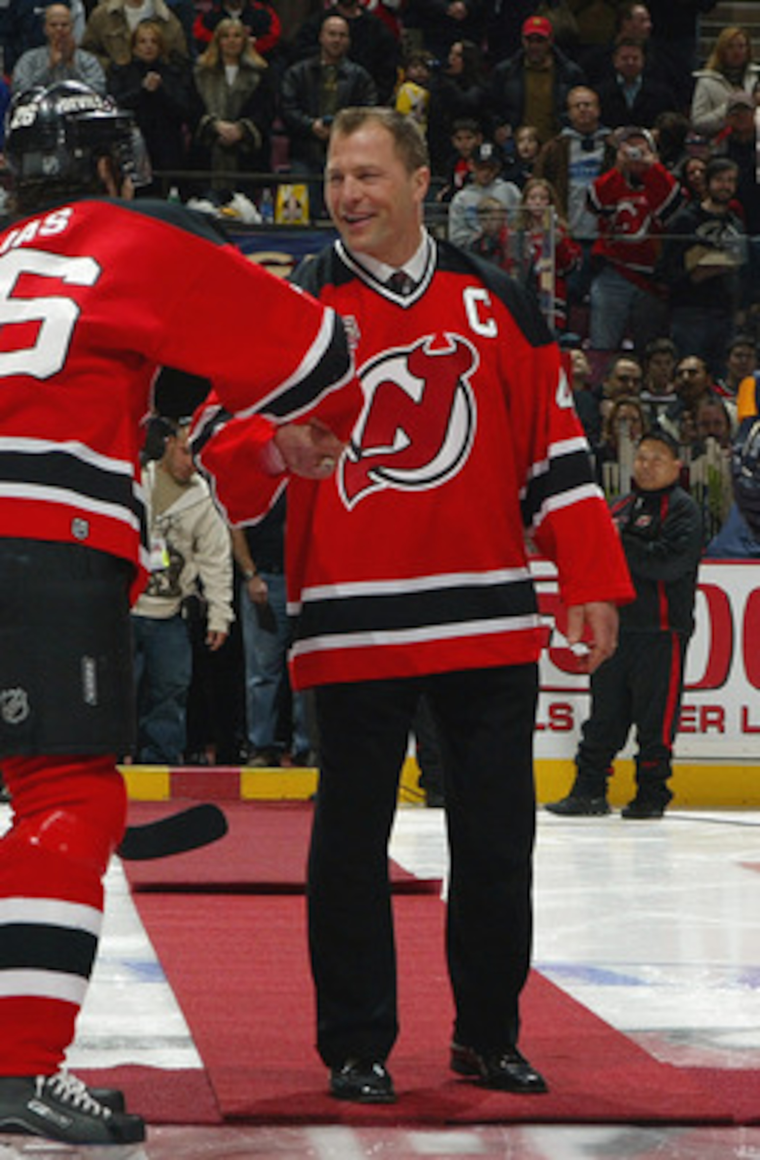 EAST RUTHERFORD, NJ - FEBRUARY 3: Fomer defenseman Scott Stevens of the New Jersey Devils shakes hands with Patrik Elias #26 prior to the game against the Buffalo Sabres during their game on February 3, 2007 at Continental Airlines Arena in East Rutherfo EAST RUTHERFORD, NJ - FEBRUARY 3: Fomer defenseman Scott Stevens of the New Jersey Devils shakes hands with Patrik Elias #26 prior to the game against the Buffalo Sabres during their game on February 3, 2007 at Continental Airlines Arena in East Rutherfo