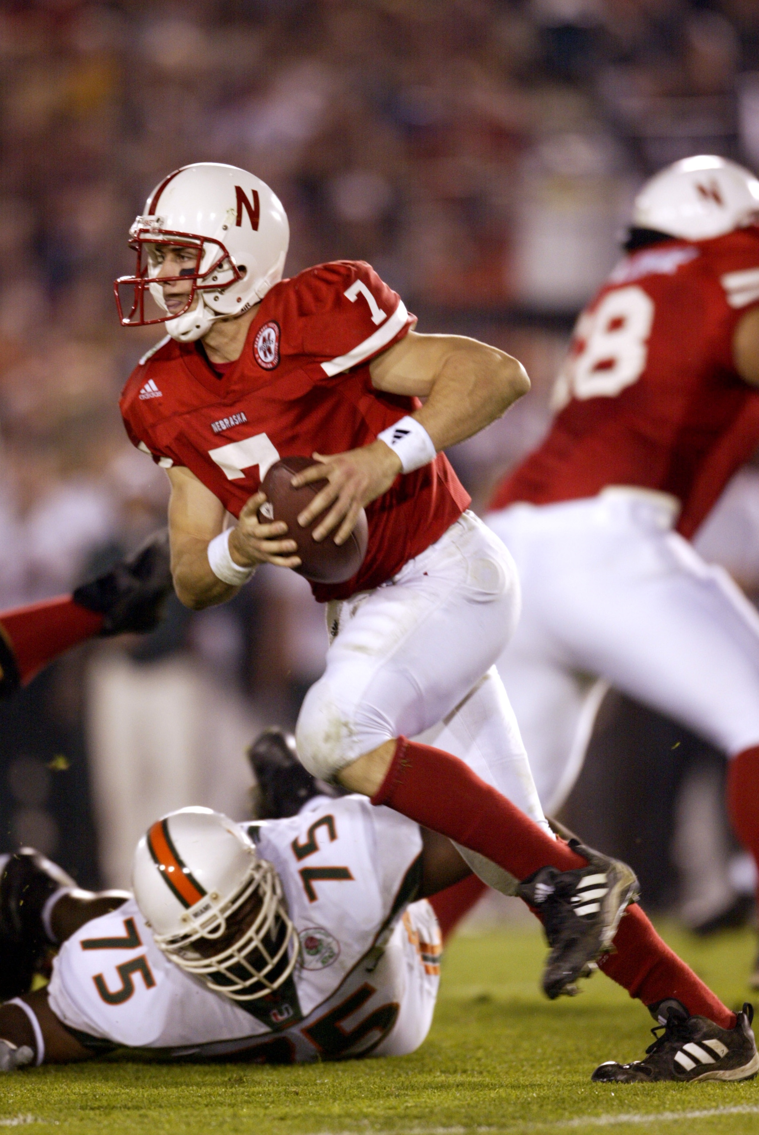 3 Jan 2002: Quarterback Eric Crouch #7 of Nebraska scrambles against the defense of Miami during the Rose Bowl National Championship game at the Rose Bowl in Pasadena, California. Miami won the game 37-14, winning the BCS and the National Championship t 3 Jan 2002: Quarterback Eric Crouch #7 of Nebraska scrambles against the defense of Miami during the Rose Bowl National Championship game at the Rose Bowl in Pasadena, California. Miami won the game 37-14, winning the BCS and the National Championship t