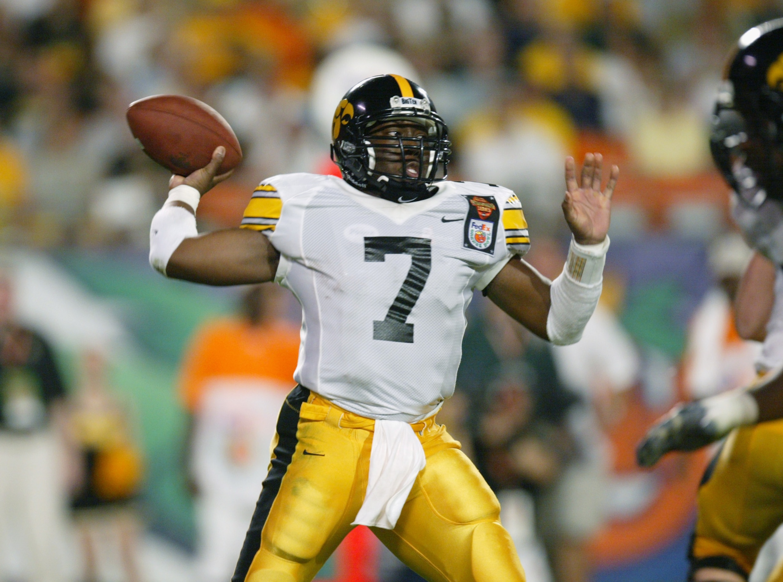 MIAMI - JANUARY 2: Brad Banks #7 of Iowa passes against USC during the FedEx Orange Bowl on January 2, 2003 at Pro Player Stadium in Miami, Florida. USC defeated Iowa 38-17. (Photo by Eliot J. Schechter/Getty Images) MIAMI - JANUARY 2: Brad Banks #7 of Iowa passes against USC during the FedEx Orange Bowl on January 2, 2003 at Pro Player Stadium in Miami, Florida. USC defeated Iowa 38-17. (Photo by Eliot J. Schechter/Getty Images)