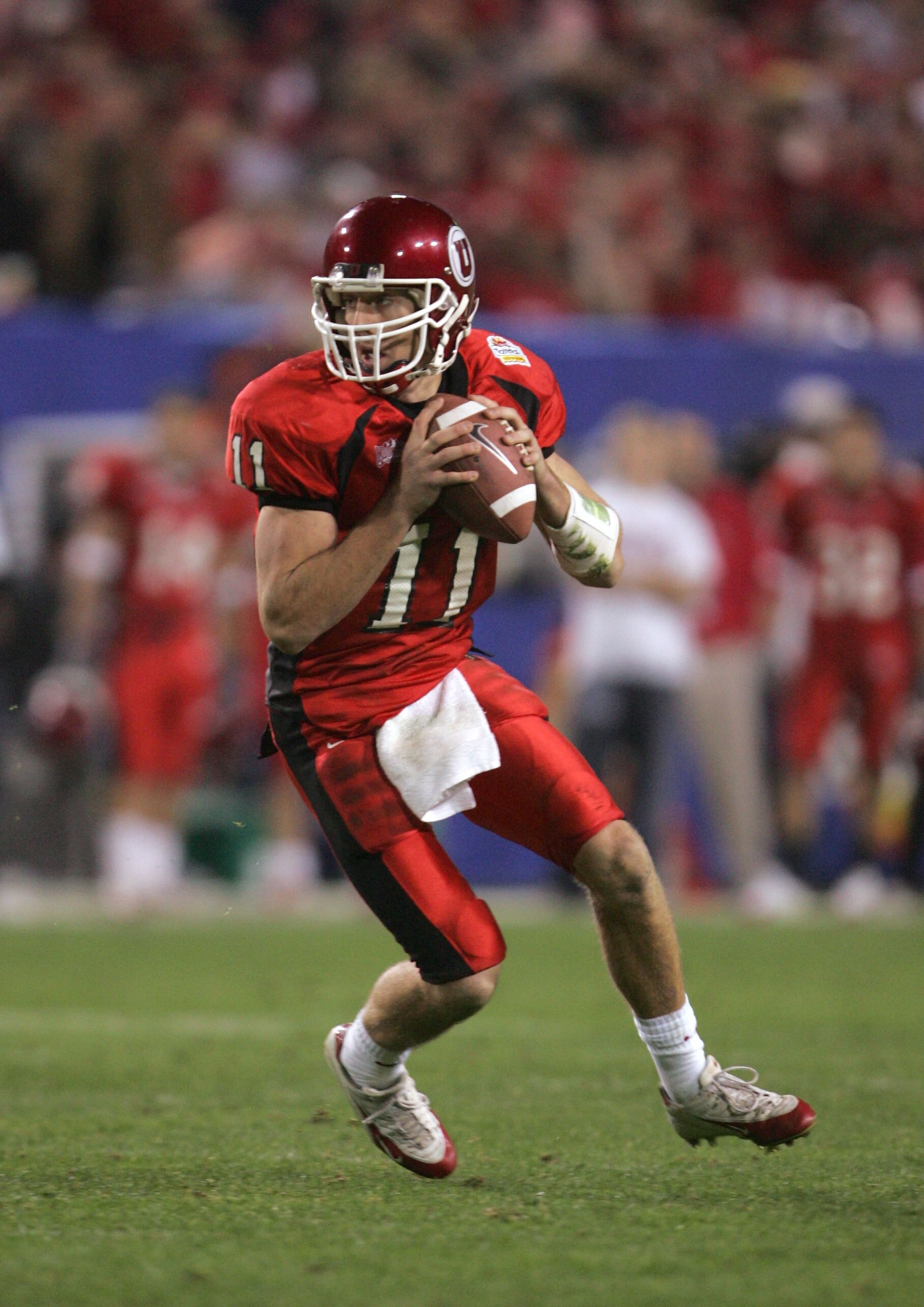 TEMPE, AZ - JANUARY 1:  Quarterback Alex Smith #11 of Utah looks to pass against Pittsburgh in the second quarter of the Tostito's Fiesta Bowl at the Sun Devil Stadium on January 1, 2005 in Tempe, Arizona. Utah would win the game 35-7. (Photo by Jeff Gros