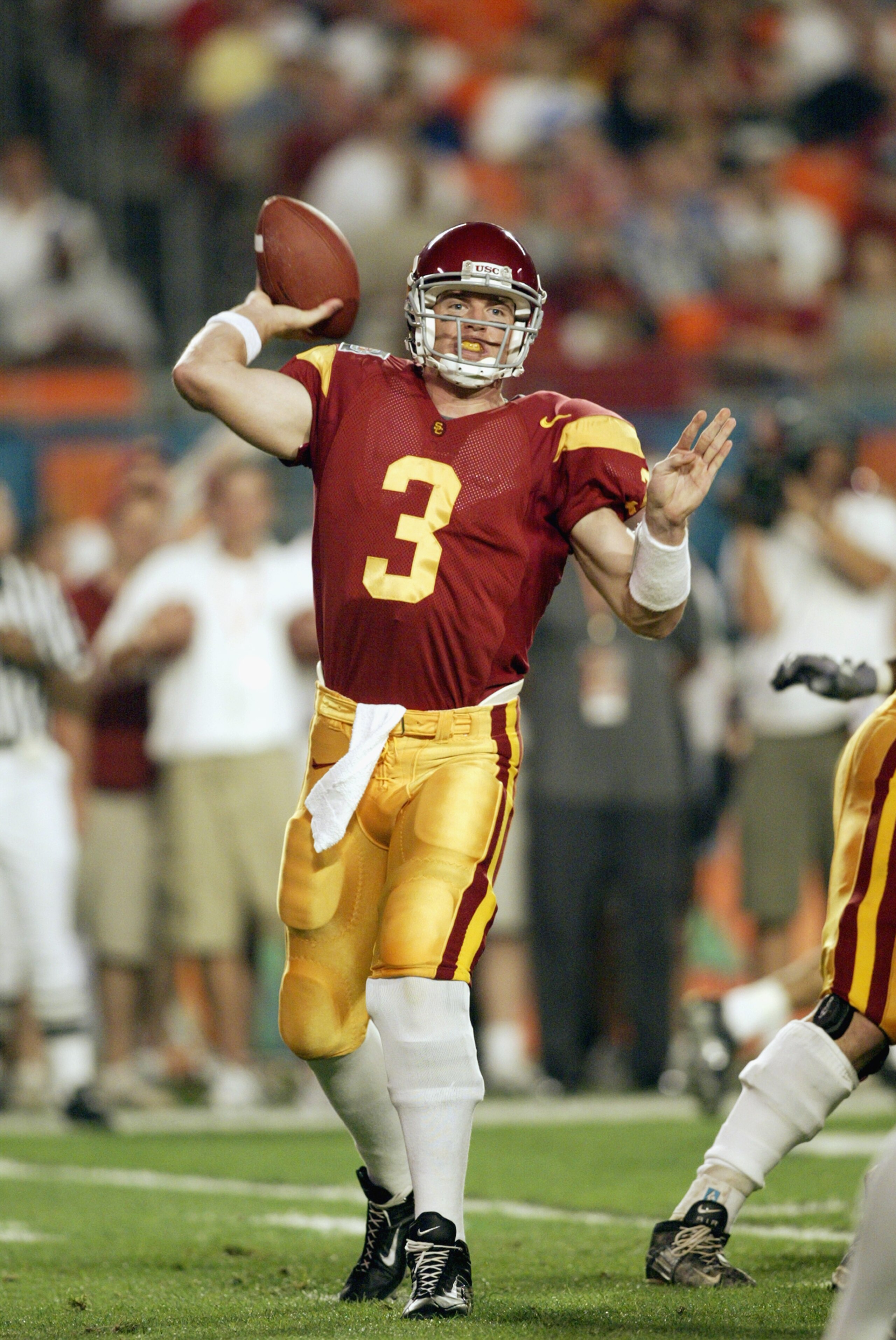 MIAMI - JANUARY 2: Quarterback Carson Palmer #3 of USC passes against Iowa during the FedEx Orange Bowl at Pro Player Stadium on January 2, 2003 in Miami, Florida. The University of Southern California Trojans defeated the Iowa Hawkeyes 38-17. (Photo b MIAMI - JANUARY 2: Quarterback Carson Palmer #3 of USC passes against Iowa during the FedEx Orange Bowl at Pro Player Stadium on January 2, 2003 in Miami, Florida. The University of Southern California Trojans defeated the Iowa Hawkeyes 38-17. (Photo b