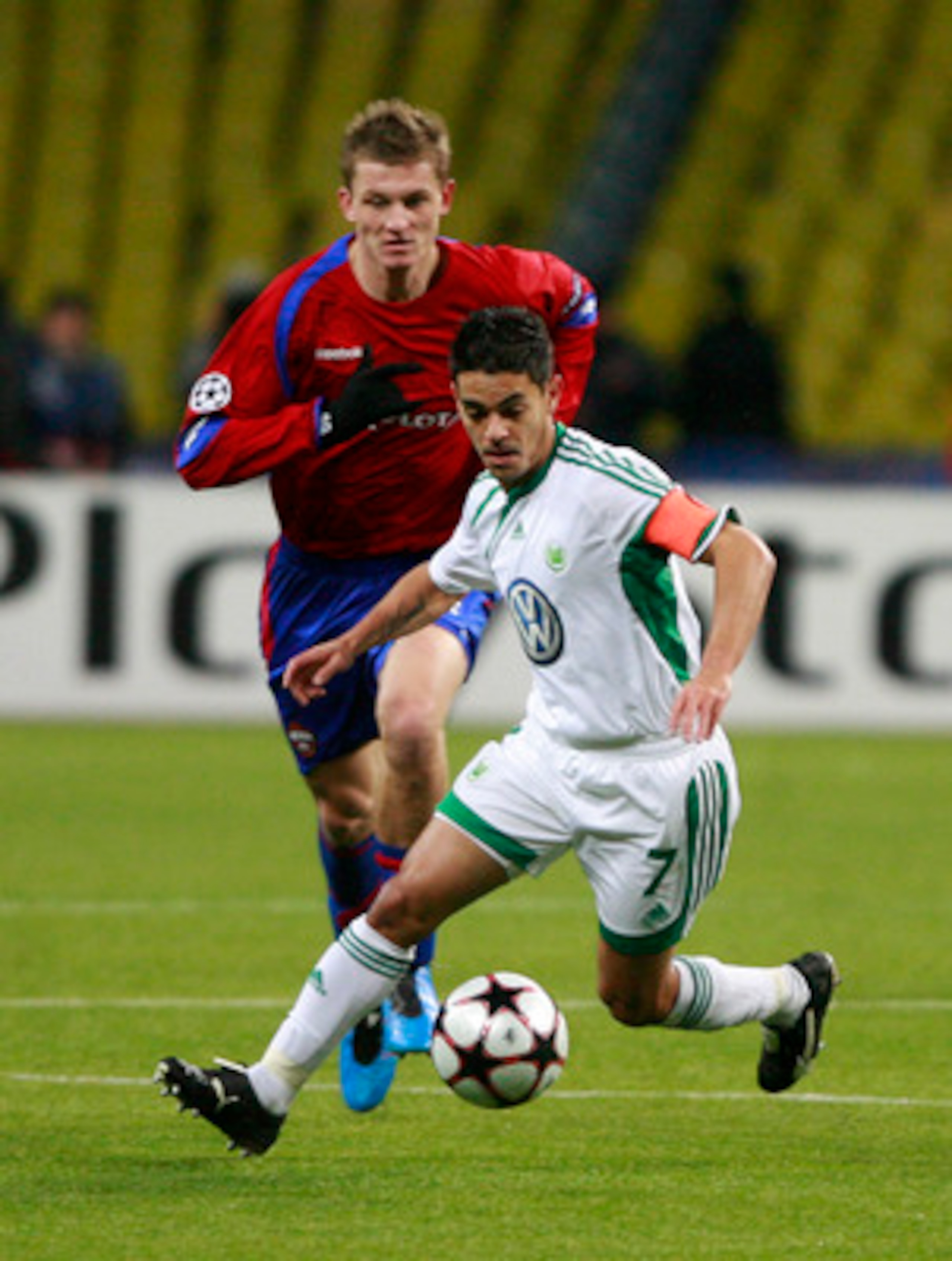 MOSCOW, RUSSIA - NOVEMBER 25: Tomas Necid (L) of CSKA Moscow competes for the ball with Josue of VfL Wolfsburg during the UEFA Champions League group B match between CSKA Moscow and VfL Wolfsburg at the Luzhniki Stadium on November 25, 2009 in Moscow, Rus MOSCOW, RUSSIA - NOVEMBER 25: Tomas Necid (L) of CSKA Moscow competes for the ball with Josue of VfL Wolfsburg during the UEFA Champions League group B match between CSKA Moscow and VfL Wolfsburg at the Luzhniki Stadium on November 25, 2009 in Moscow, Rus