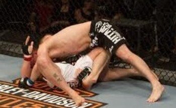 Darren Elkins securing a takedown