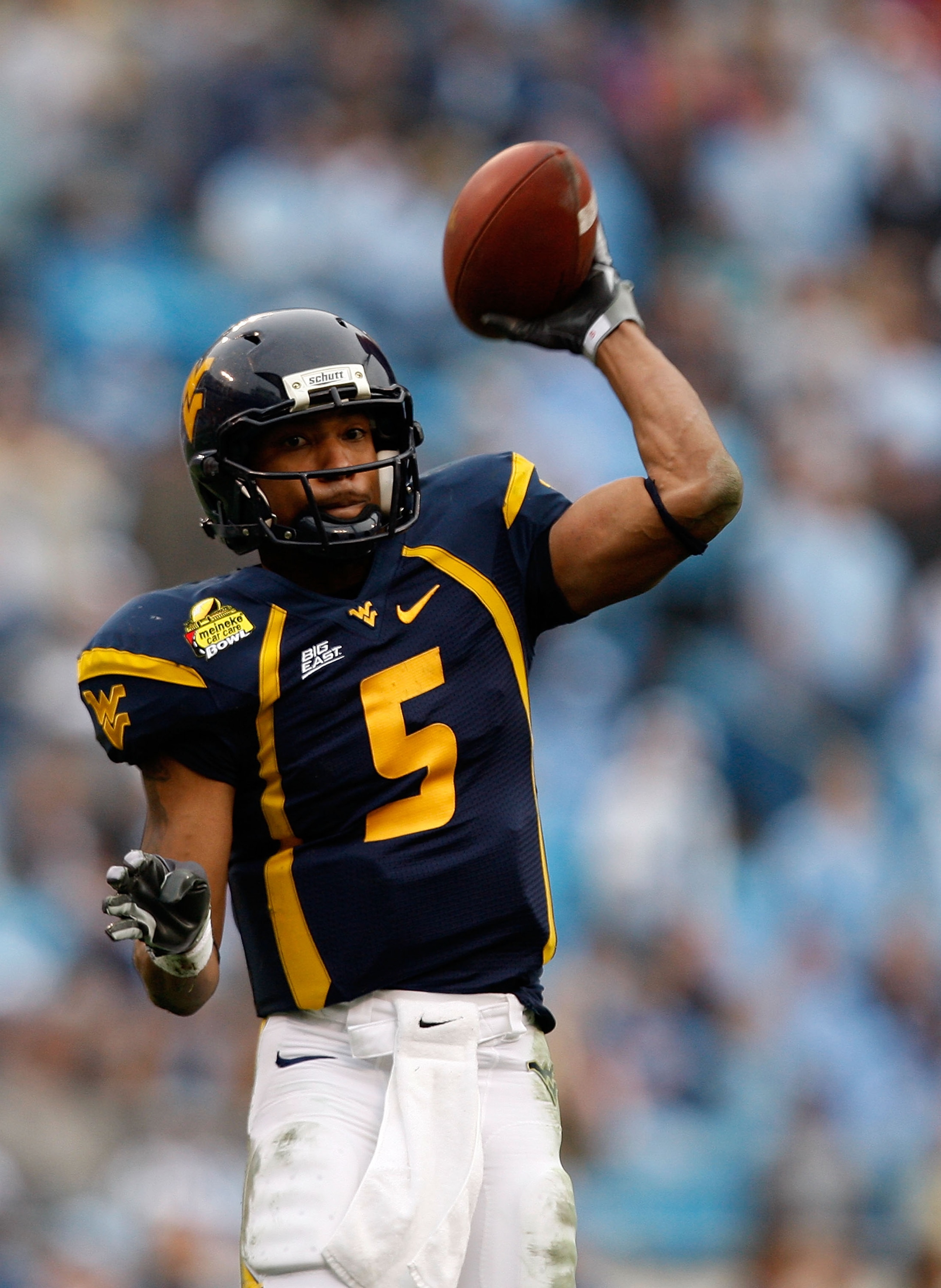 CHARLOTTE, NC - DECEMBER 27: Pat White #5 of the West Virginia Mountaineers throws a pass against the North Carolina Tar Heels during the Meineke Car Care Bowl on December 27, 2008 at Bank of America Stadium in Charlotte, North Carolina. (Photo by Stree CHARLOTTE, NC - DECEMBER 27: Pat White #5 of the West Virginia Mountaineers throws a pass against the North Carolina Tar Heels during the Meineke Car Care Bowl on December 27, 2008 at Bank of America Stadium in Charlotte, North Carolina. (Photo by Stree