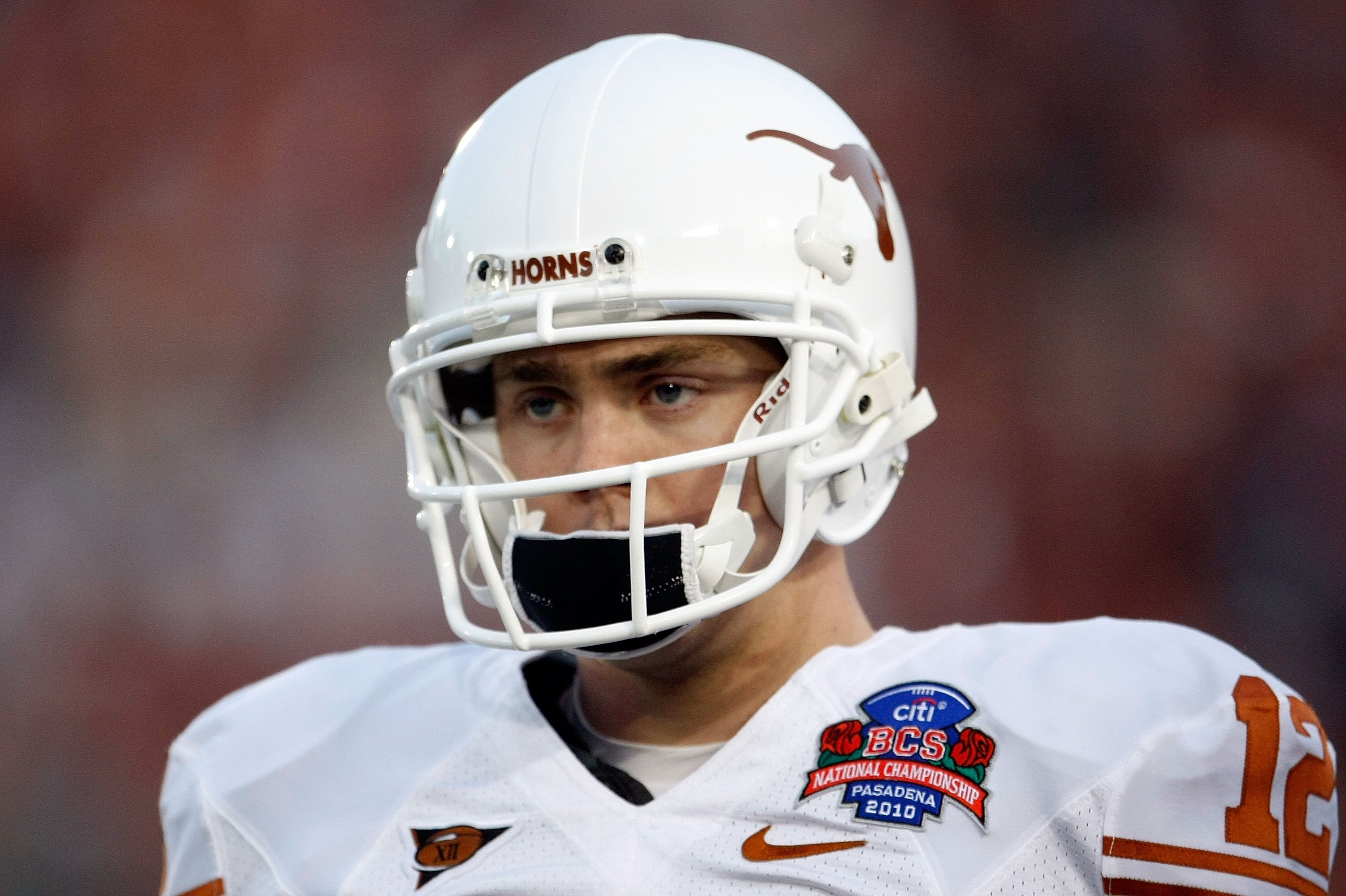 PASADENA, CA - JANUARY 07:  Quarterback Colt McCoy #12 of the Texas Longhorns looks on before taking on the Alabama Crimson Tide in the Citi BCS National Championship game at the Rose Bowl on January 7, 2010 in Pasadena, California.  (Photo by Jeff Gross/