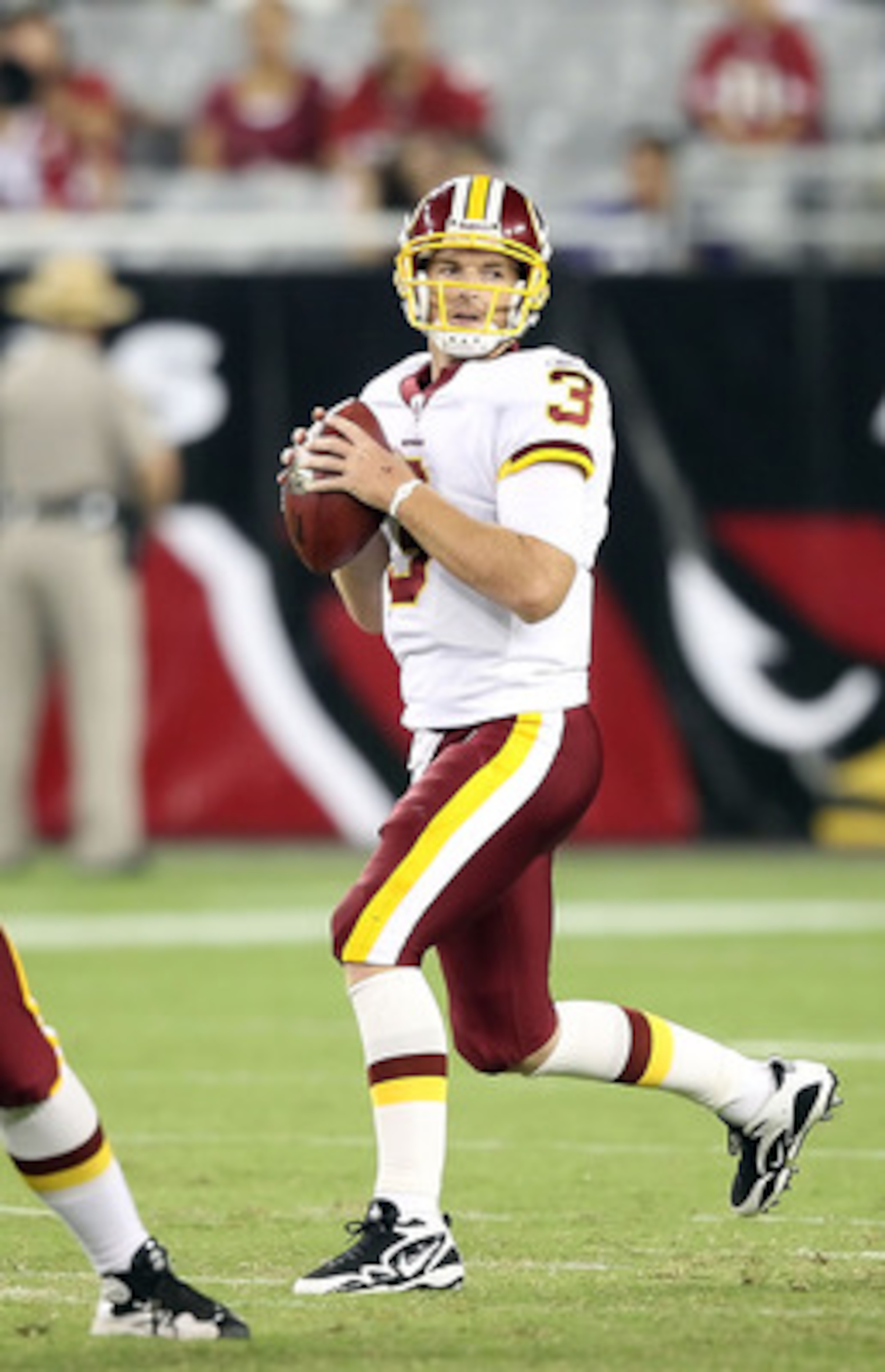 GLENDALE, AZ - SEPTEMBER 02:  Quarterback John Beck #3 of the Washington Redskins drops back to pass during the first quarter of the preseason NFL game against the Arizona Cardinals at the University of Phoenix Stadium on September 2, 2010 in Glendale, Ar