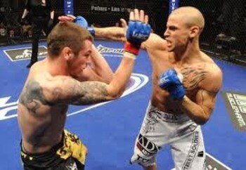 Dustin Poirier exchanging in the stand-up