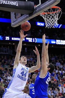 NEWARK, NJ - MARCH 27:  Tyler Zeller #44 of the North Carolina Tar Heels in action against Josh Harrellson #55 of the Kentucky Wildcats during the east regional final of the 2011 NCAA men's basketball tournament at Prudential Center on March 27, 2011 in N