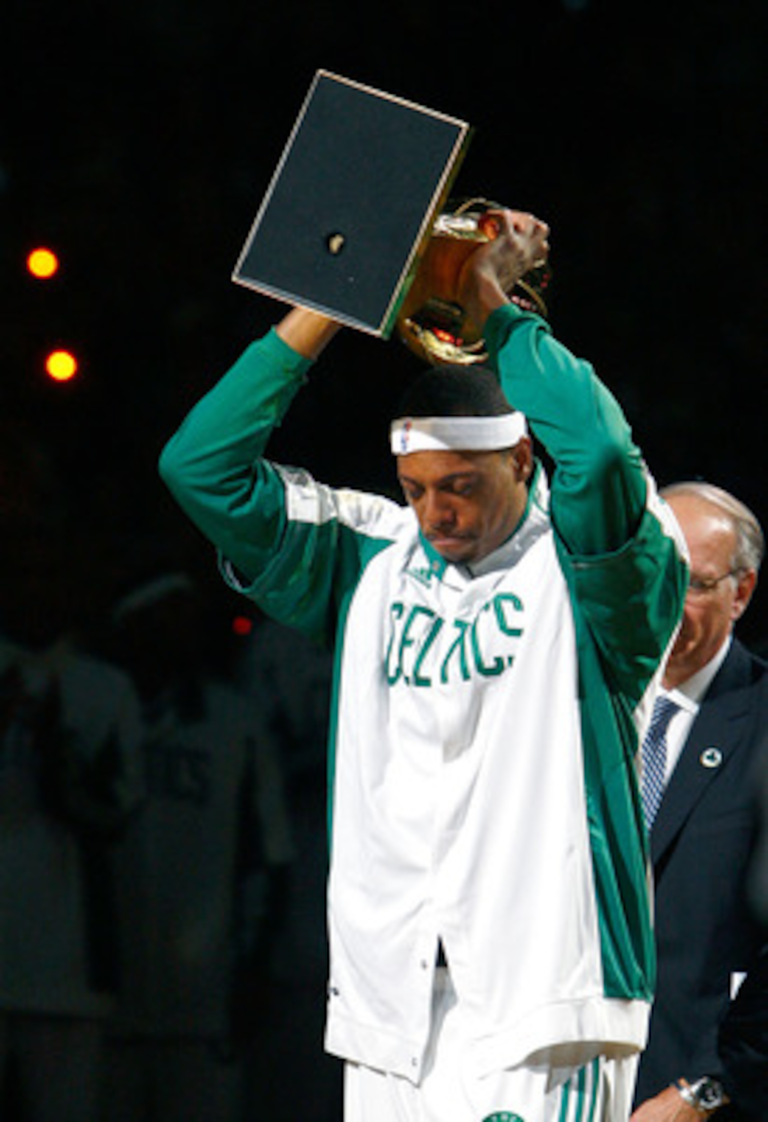 BOSTON, MA - OCTOBER 28: Paul Pierce #34 of the Boston Celtics raise the 2008 World Championship trophy during the 2008 NBA World Championship ceremony before a game against the Cleveland Cavaliersat the TD Banknorth Garden on October 28, 2008 in Boston, 