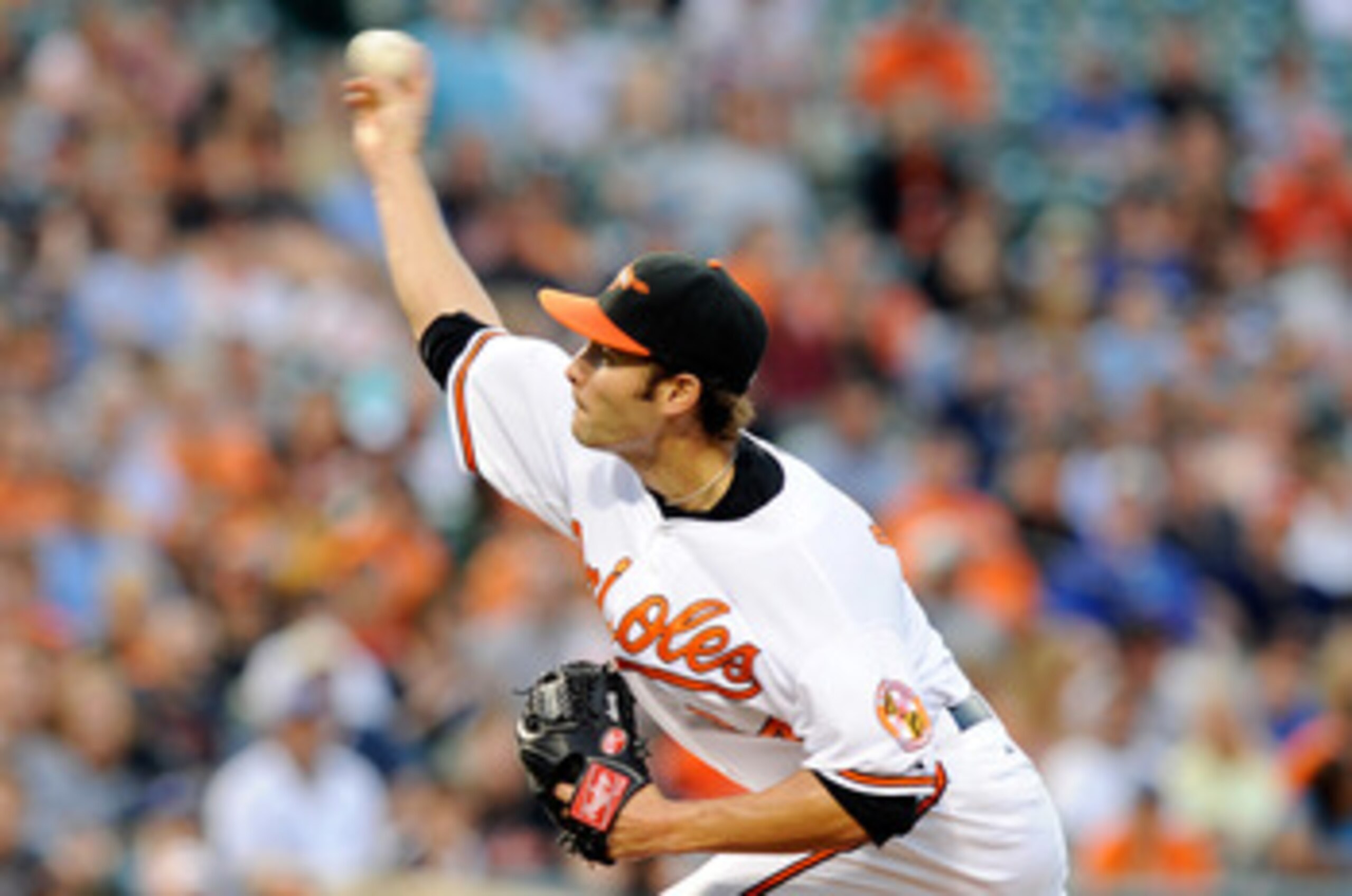 BALTIMORE, MD - JUNE 04:  Jake Arrieta #34 of the Baltimore Orioles pitches against the Toronto Blue Jays at Oriole Park at Camden Yards on June 4, 2011 in Baltimore, Maryland.  (Photo by Greg Fiume/Getty Images)