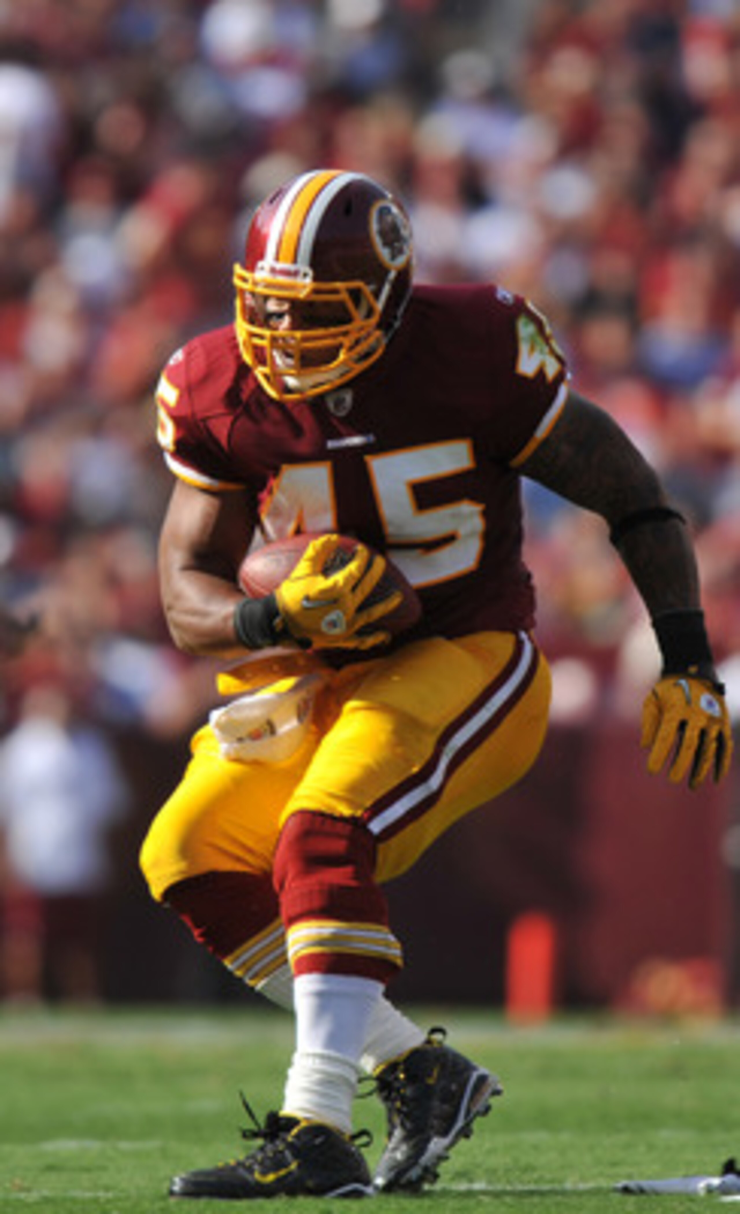 LANDOVER - SEPTEMBER 19:  Mike Sellers #45 of the Washington Redskins runs the ball against the Houston Texans at FedExField on September 19, 2010 in Landover, Maryland. The Texans defeated the Redskins in overtime 30-27. (Photo by Larry French/Getty Imag