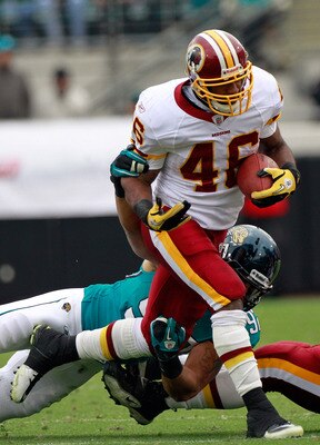 JACKSONVILLE, FL - DECEMBER 26: Austen Lane #92 of the Jacksonville Jaguars attempts to tackle Ryan Torain #46 of the Washington Redskins during the game at EverBank Field on December 26, 2010 in Jacksonville, Florida. (Photo by Sam Greenwood/Getty Image JACKSONVILLE, FL - DECEMBER 26: Austen Lane #92 of the Jacksonville Jaguars attempts to tackle Ryan Torain #46 of the Washington Redskins during the game at EverBank Field on December 26, 2010 in Jacksonville, Florida. (Photo by Sam Greenwood/Getty Image