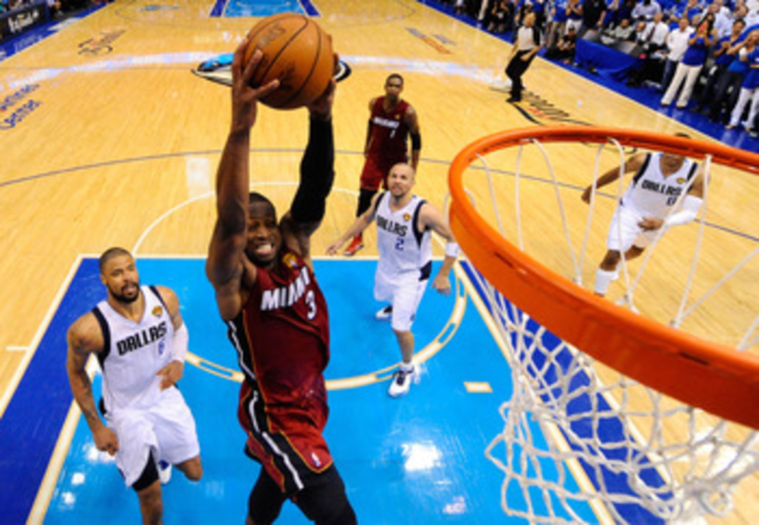 DALLAS, TX - JUNE 07:  Dwyane Wade #3 of the Miami Heat dunks against the Dallas Mavericks in Game Four of the 2011 NBA Finals at American Airlines Center on June 7, 2011 in Dallas, Texas. NOTE TO USER: User expressly acknowledges and agrees that, by down