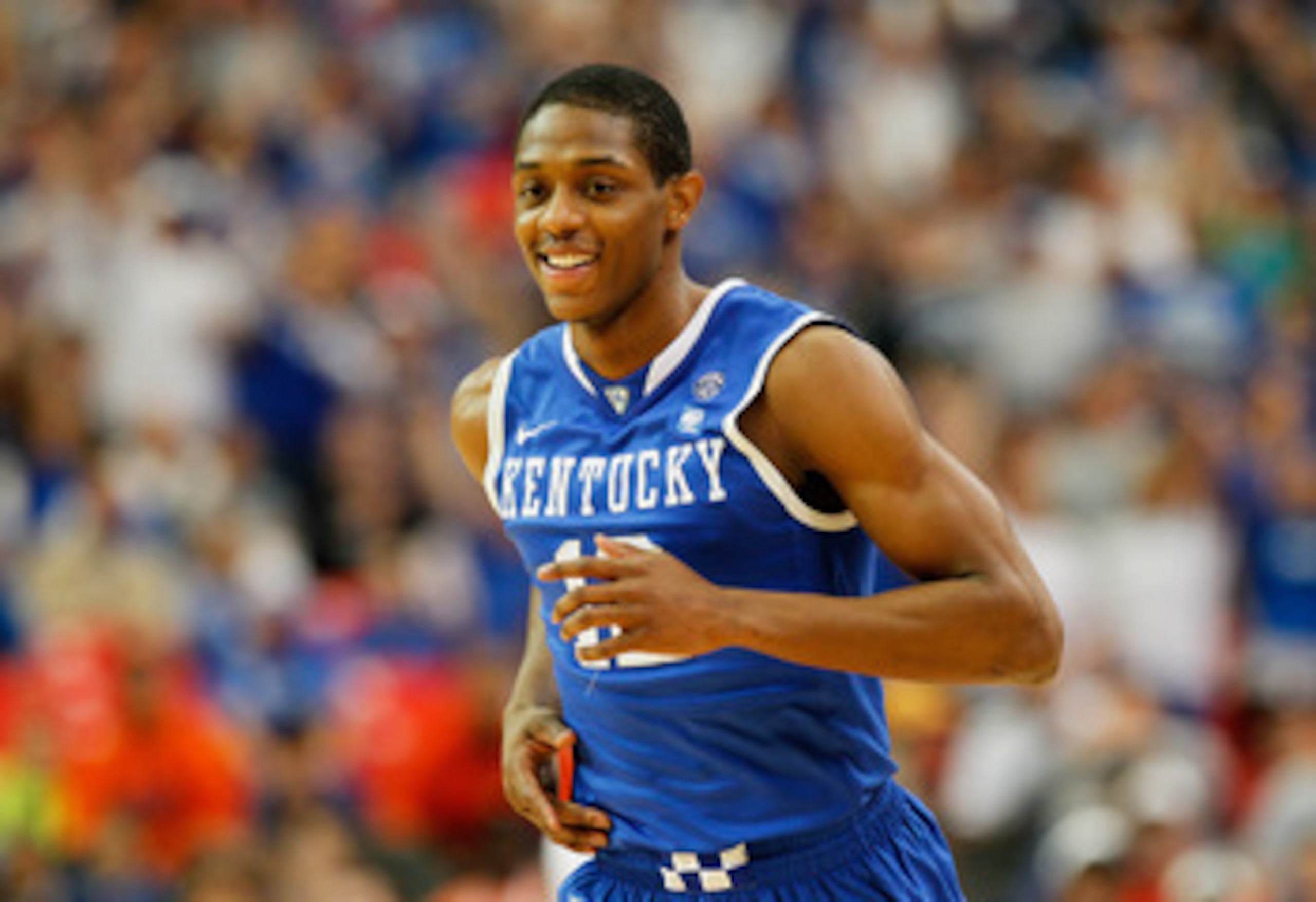 ATLANTA, GA - MARCH 13:  Brandon Knight #12 of the Kentucky Wildcats celebrates during their 70 to 54 win over the Florida Gators in the championship game of the SEC Men's Basketball Tournament at Georgia Dome on March 13, 2011 in Atlanta, Georgia.  (Phot