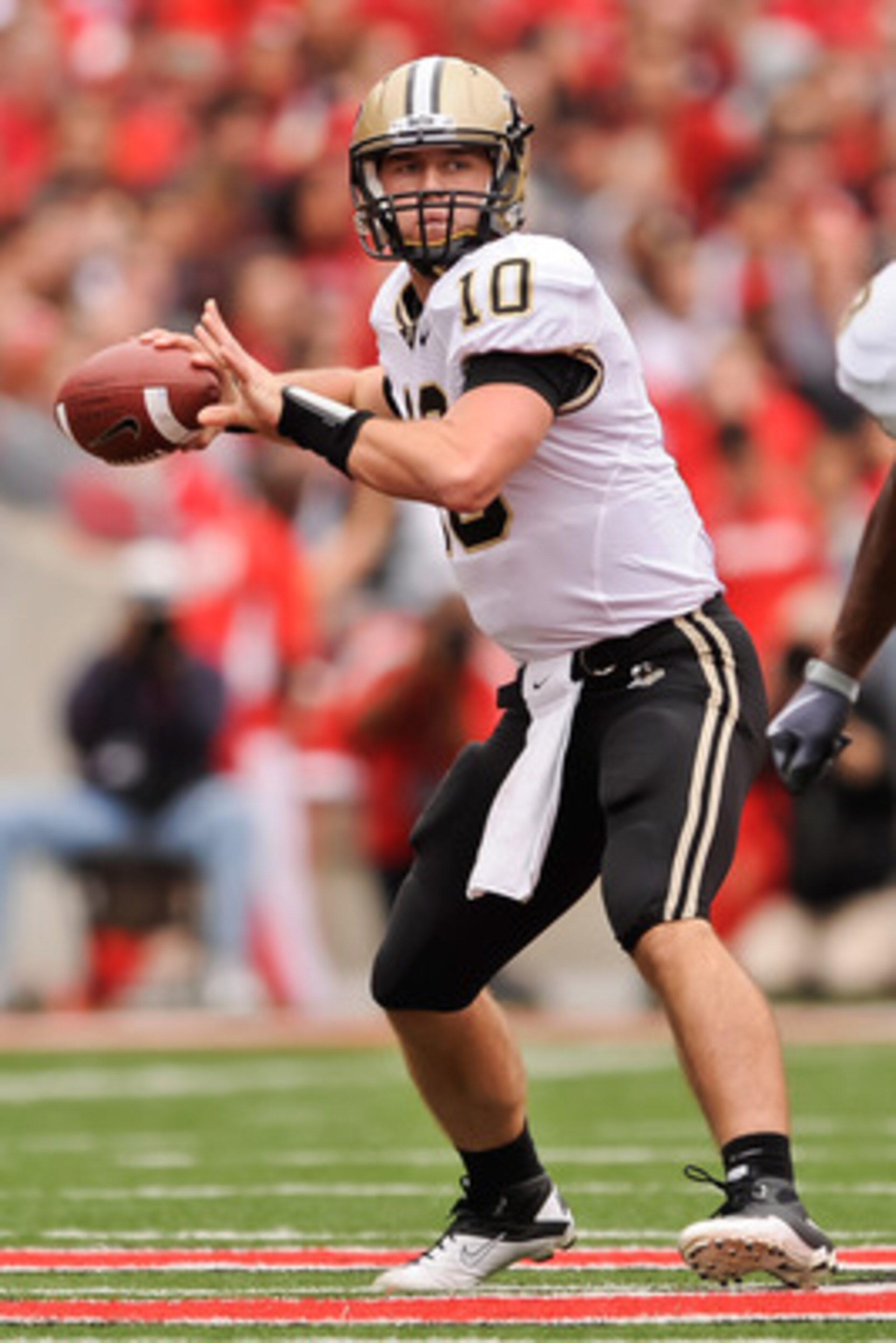 COLUMBUS, OH - OCTOBER 23:  Quarterback Sean Robinson #10 of the Purdue Boilermakers drops back to pass against the Ohio State Buckeyes at Ohio Stadium on October 23, 2010 in Columbus, Ohio.  (Photo by Jamie Sabau/Getty Images)