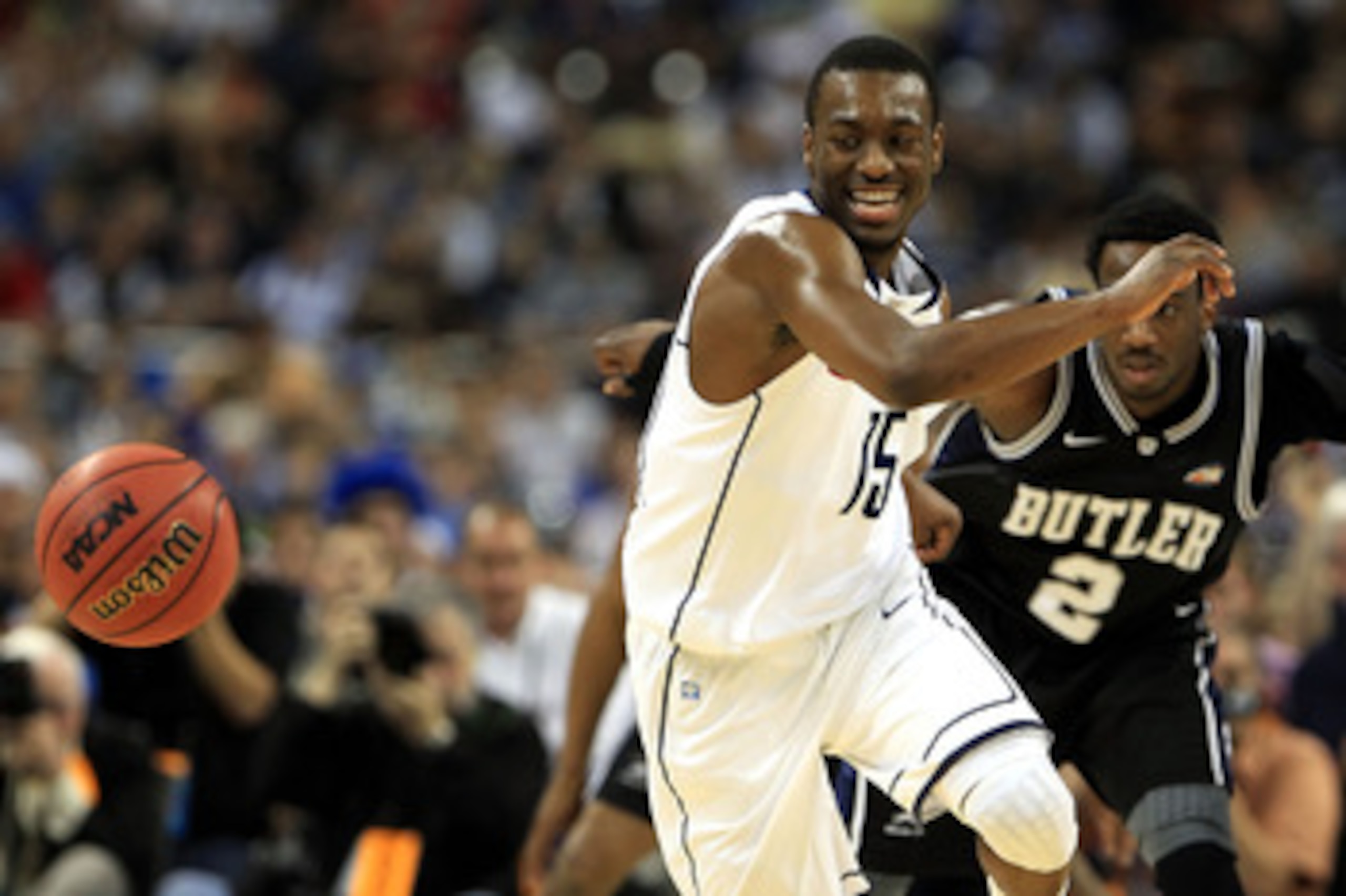 HOUSTON, TX - APRIL 04:  Kemba Walker #15 of the Connecticut Huskies chase after the ball against the Butler Bulldogs during the National Championship Game of the 2011 NCAA Division I Men's Basketball Tournament at Reliant Stadium on April 4, 2011 in Hous